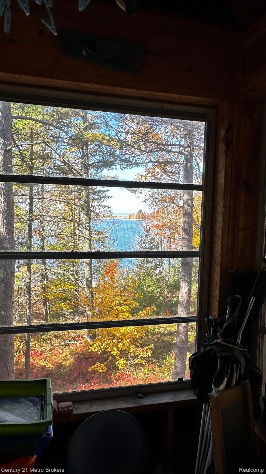 6398 County Road 412 Newberry, MI 49868 - Photo 65 of 81 Enclosed Porch crank put windows