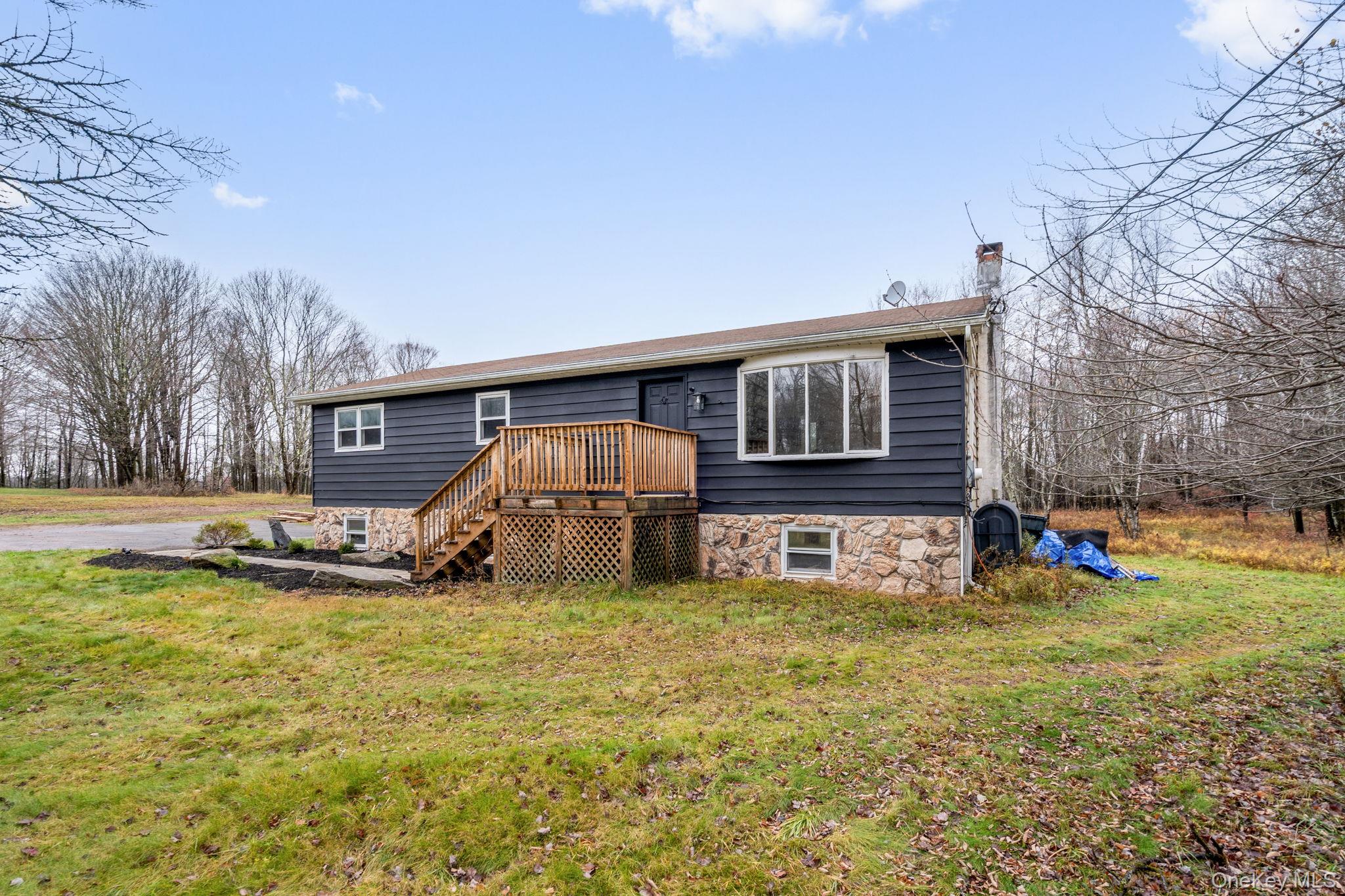 178 Bowers Road Loch Sheldrake, NY 12759 - Photo 28 of 47 a view of a house with yard and sitting area