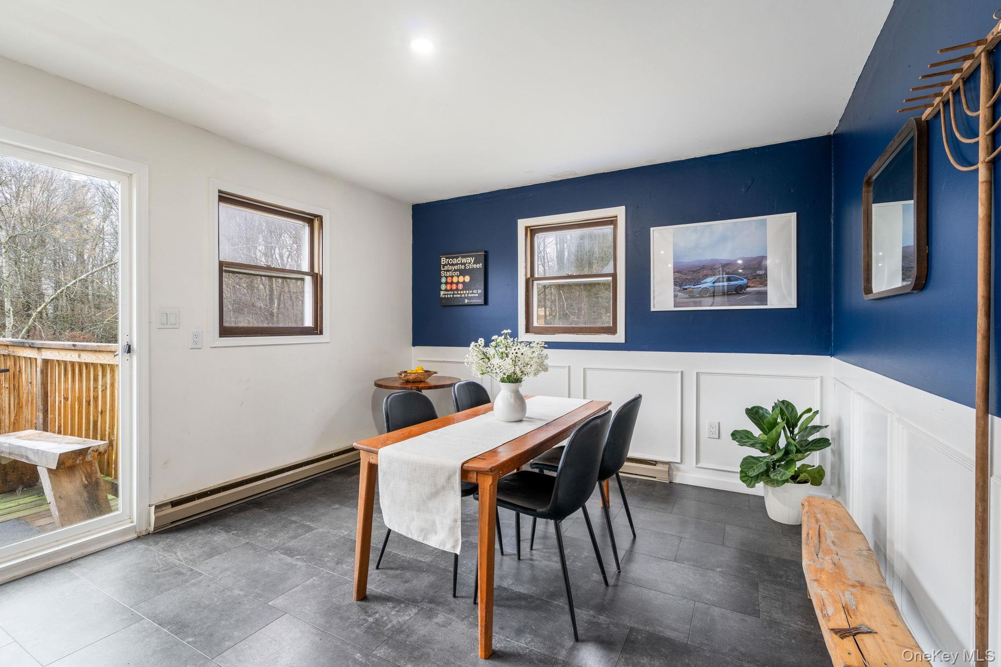 178 Bowers Road Loch Sheldrake, NY 12759 - Photo 7 of 47 a view of a dining room with furniture window and wooden floor