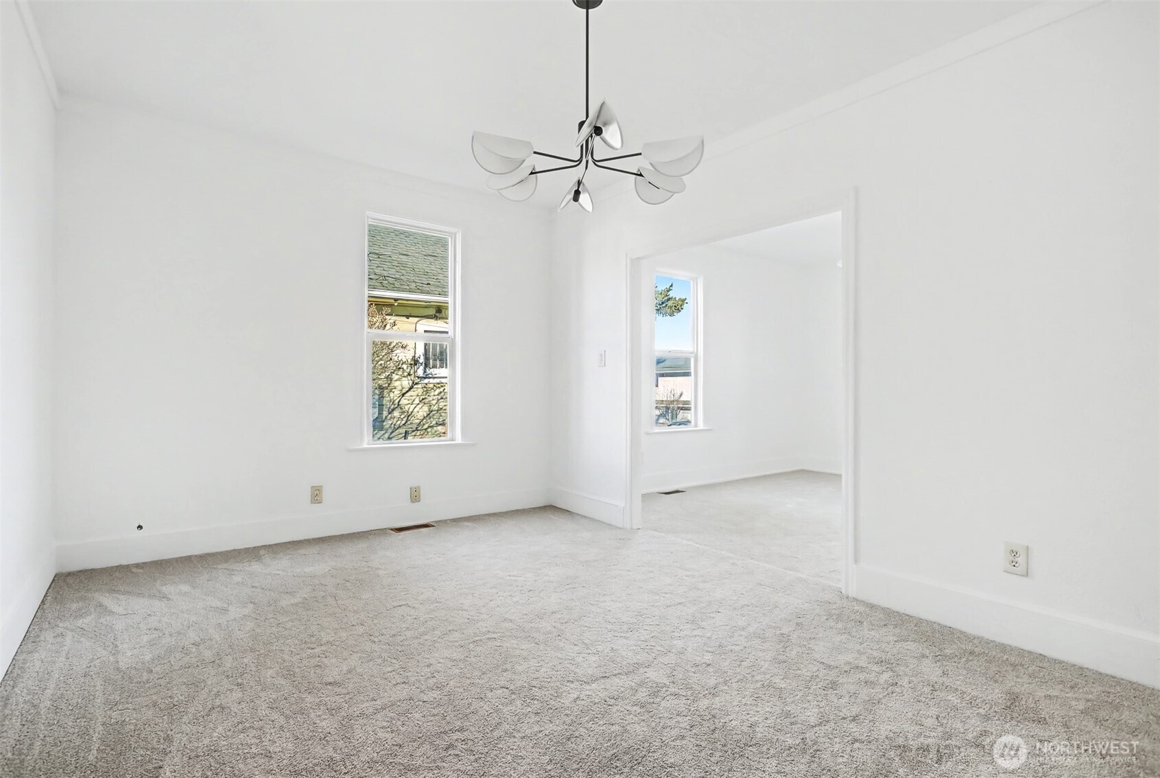 1328 Chestnut Street Everett, WA 98201 - Photo 12 of 24 an empty room with windows and fan