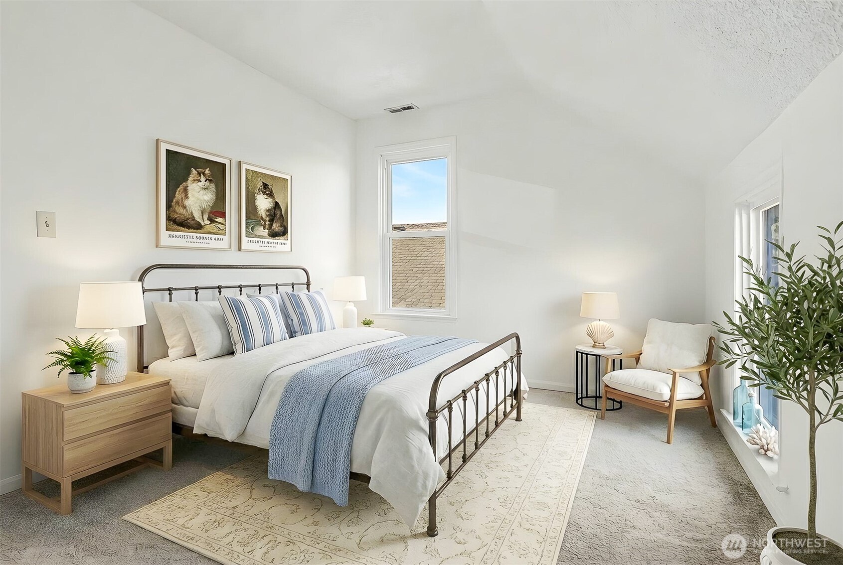 1328 Chestnut Street Everett, WA 98201 - Photo 15 of 24 a spacious bedroom with a bed and a couch