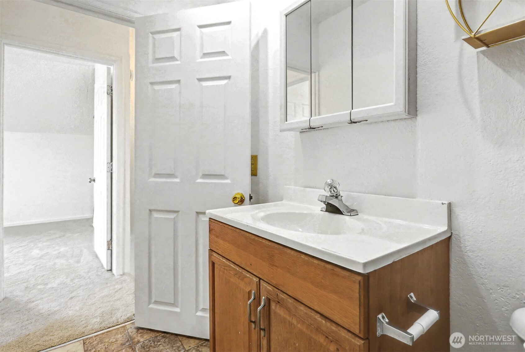 1328 Chestnut Street Everett, WA 98201 - Photo 18 of 24 a bathroom with a sink and a mirror