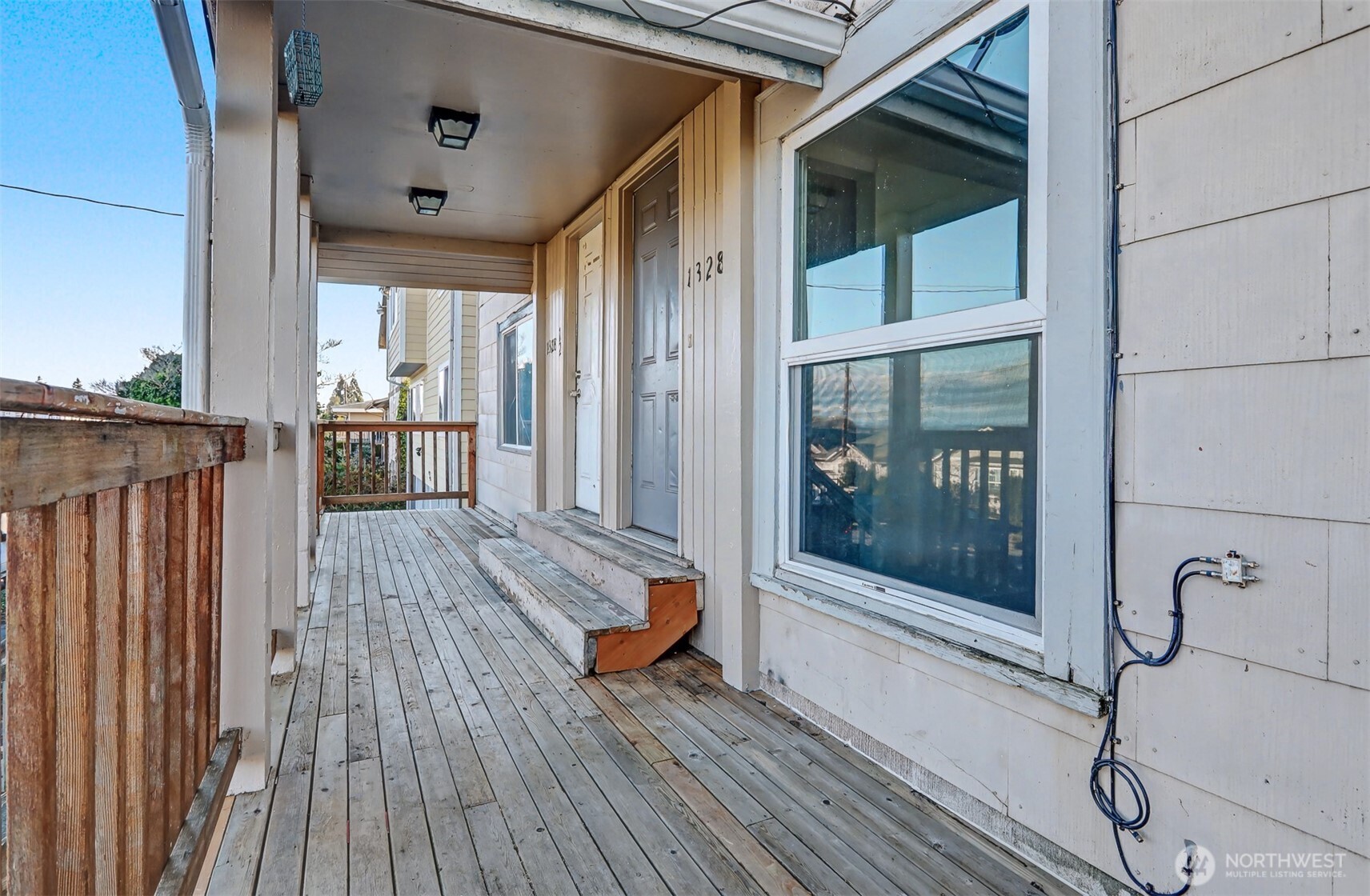 1328 Chestnut Street Everett, WA 98201 - Photo 3 of 24 a view of outdoor space with wooden floor and windows