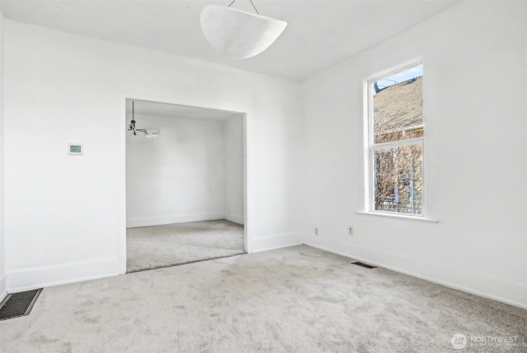 1328 Chestnut Street Everett, WA 98201 - Photo 5 of 24 an empty room with windows