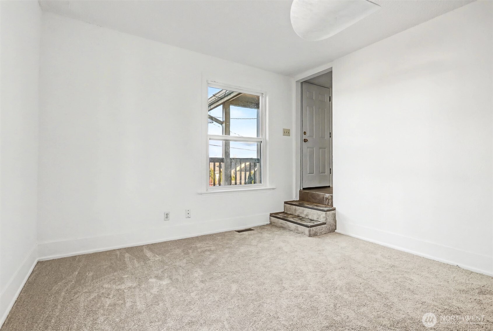 1328 Chestnut Street Everett, WA 98201 - Photo 6 of 24 an empty room with windows