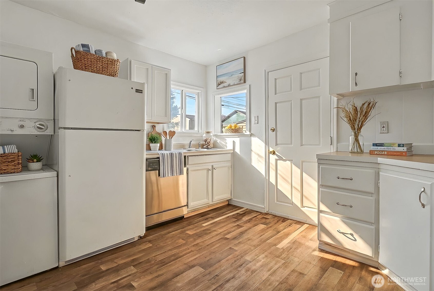 1328 Chestnut Street Everett, WA 98201 - Photo 7 of 24 a kitchen with white cabinets and white appliances