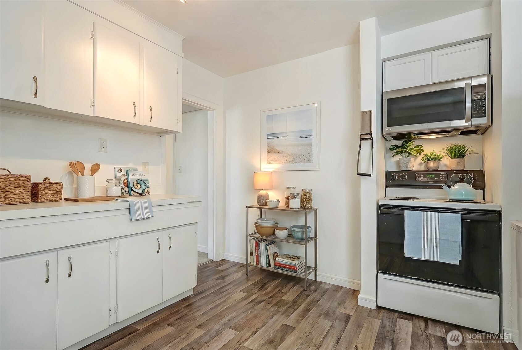 1328 Chestnut Street Everett, WA 98201 - Photo 8 of 24 a kitchen with stainless steel appliances a stove microwave and refrigerator