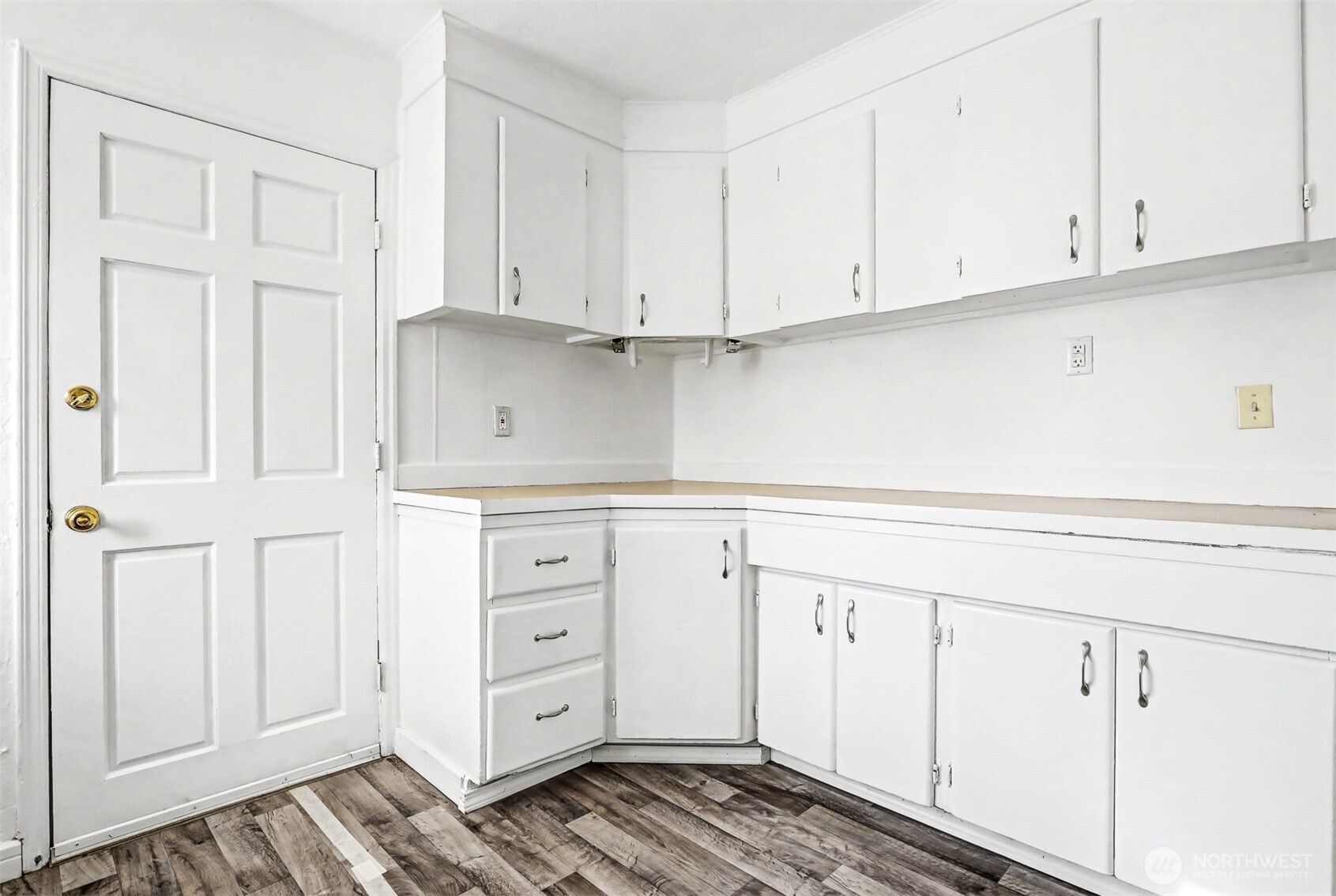 1328 Chestnut Street Everett, WA 98201 - Photo 10 of 24 a kitchen with white cabinets and white appliances