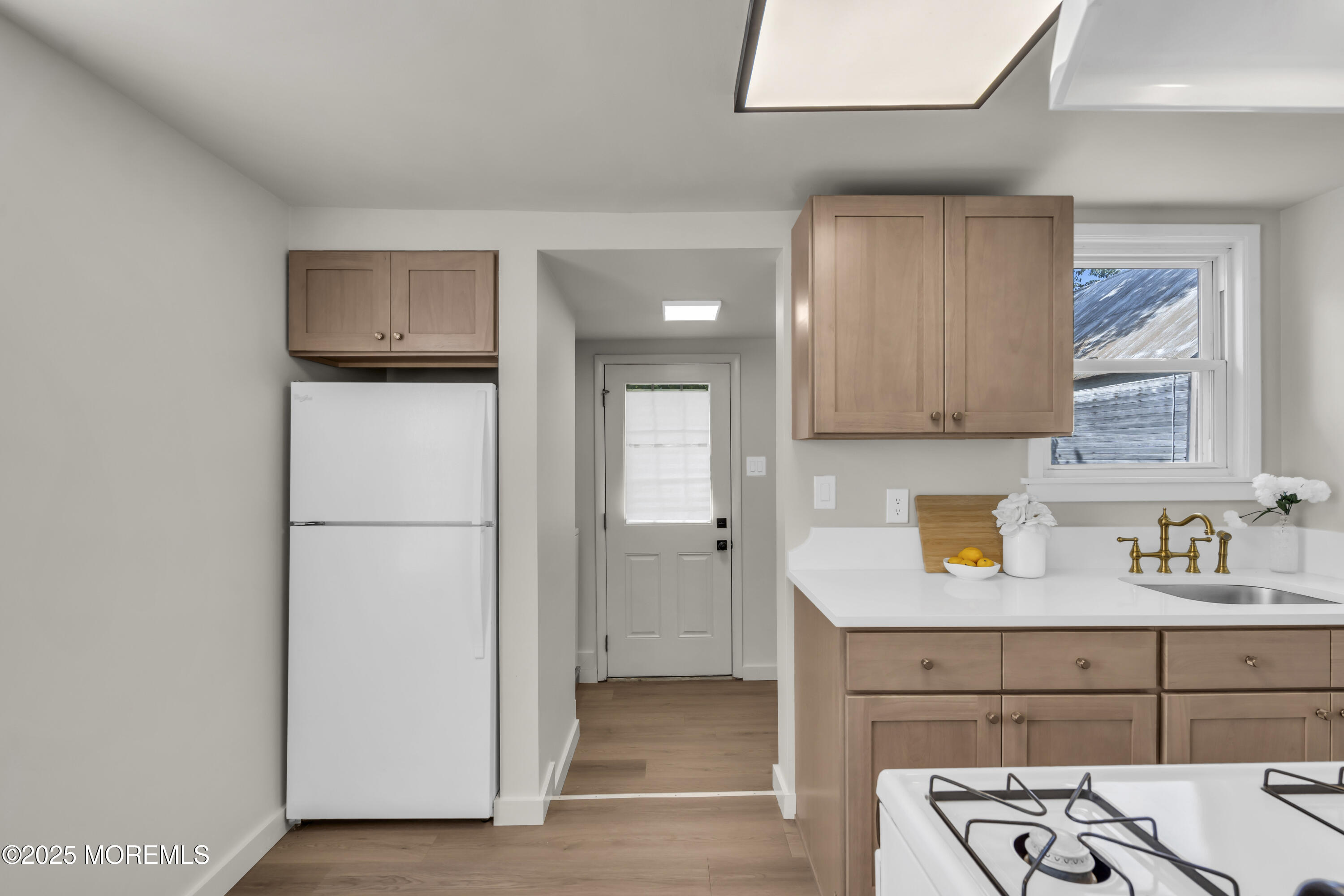 70-72 Jacobstown Road New Egypt, NJ 08533 - Photo 11 of 72 a kitchen with a refrigerator and cabinets