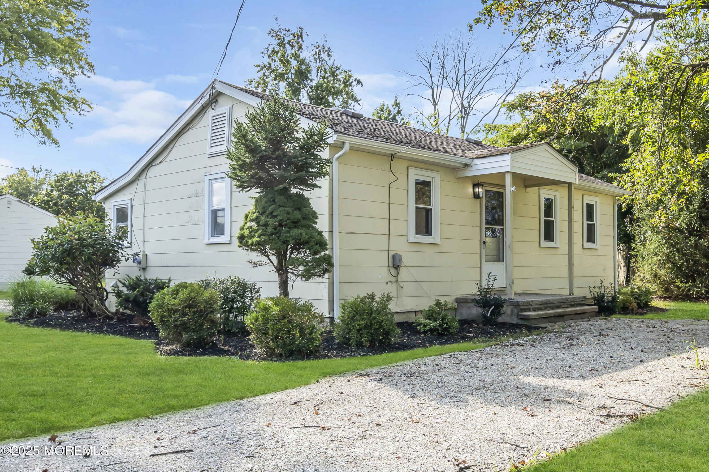 70-72 Jacobstown Road New Egypt, NJ 08533 - Photo 36 of 72 a front view of a house with garden