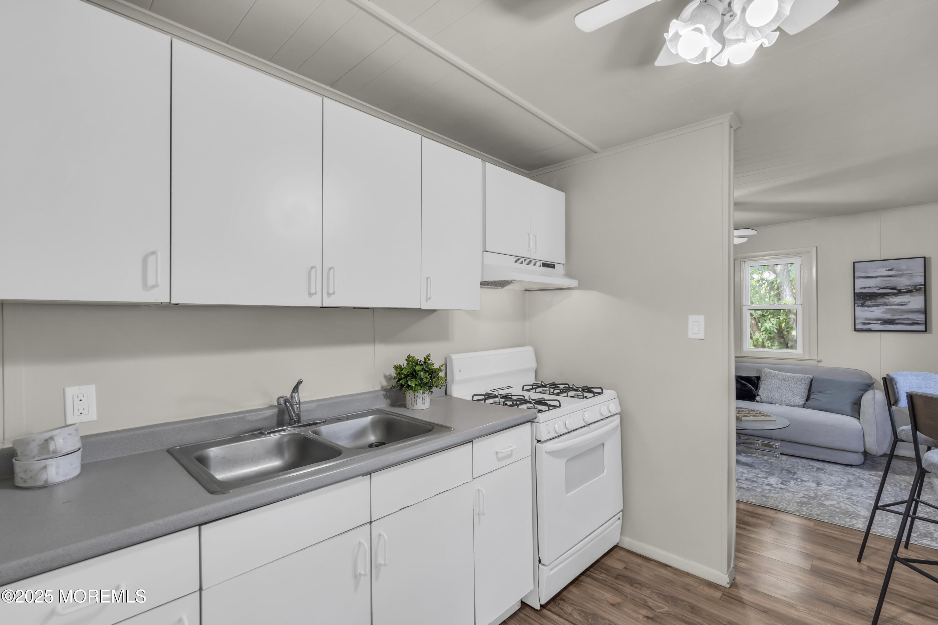 70-72 Jacobstown Road New Egypt, NJ 08533 - Photo 44 of 72 a kitchen with granite countertop a sink a stove and cabinets