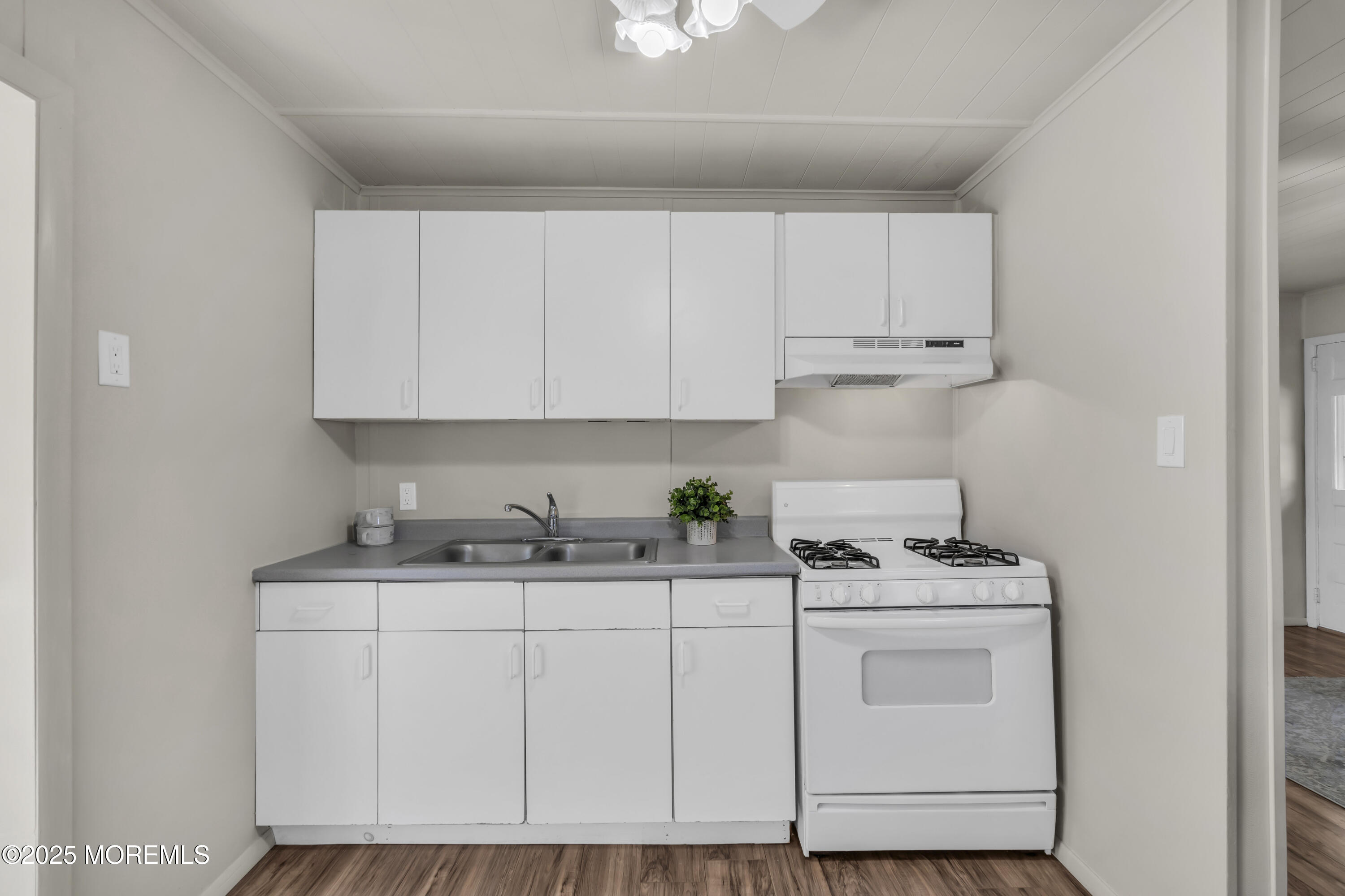 70-72 Jacobstown Road New Egypt, NJ 08533 - Photo 49 of 72 a kitchen with stainless steel appliances granite countertop a sink stove and cabinets
