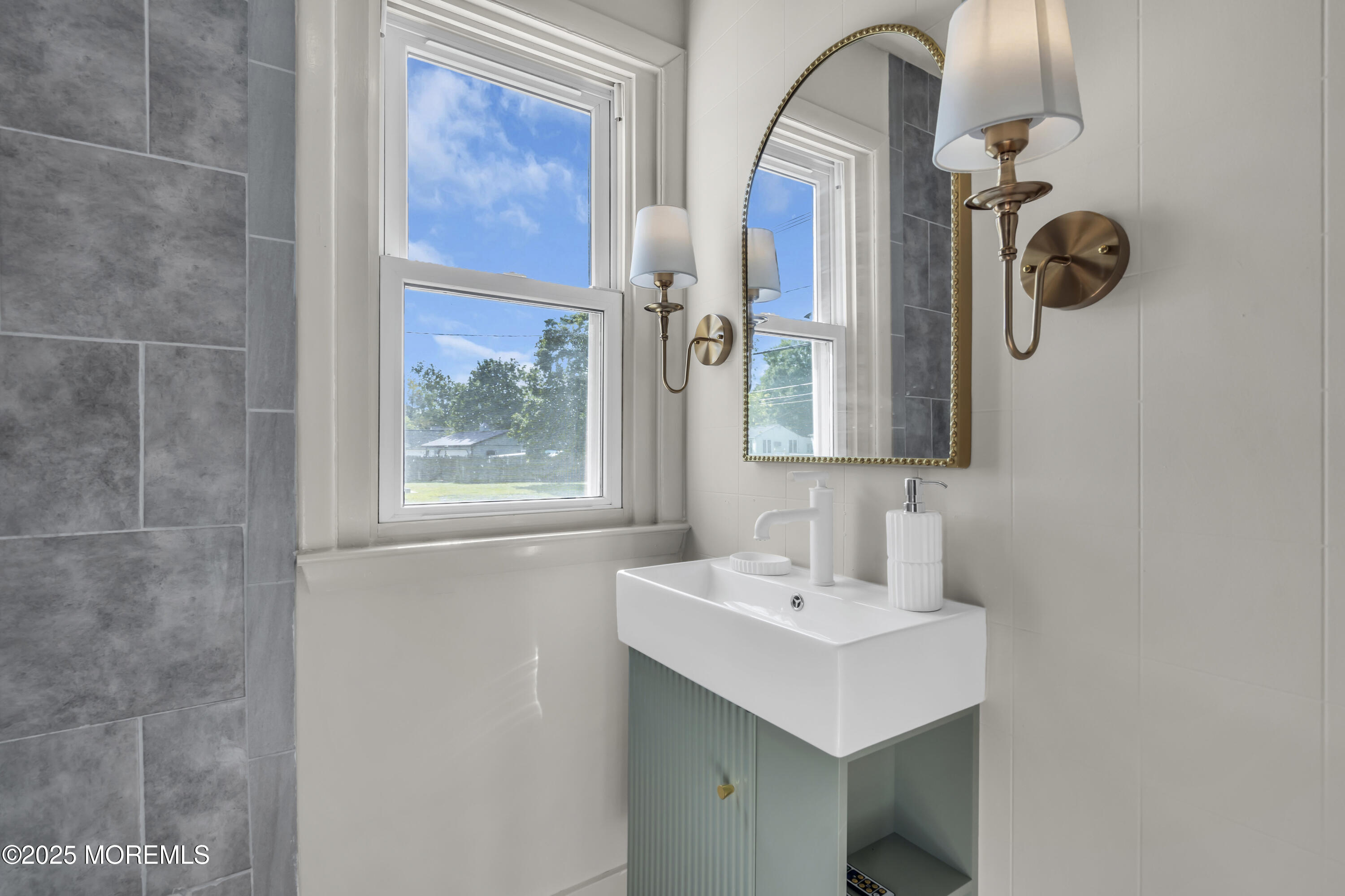70-72 Jacobstown Road New Egypt, NJ 08533 - Photo 57 of 72 a bathroom with a sink and a mirror