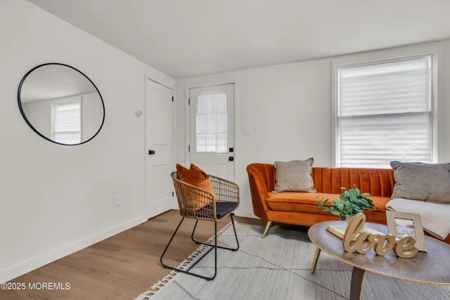 a view of storage and utility room with washer and dryer