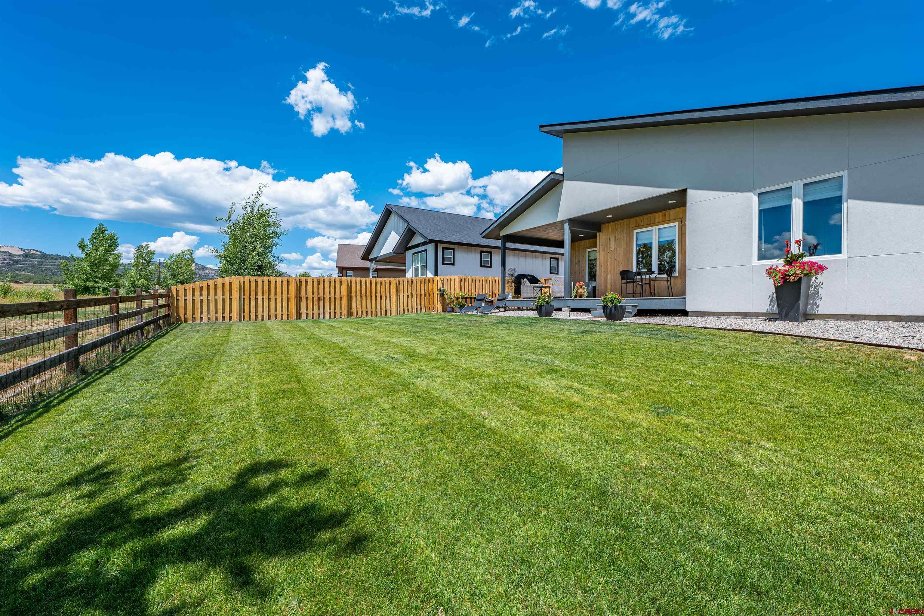 74 Prospector Avenue Durango, CO 81301 - Photo 30 of 30 a view of a house with a yard