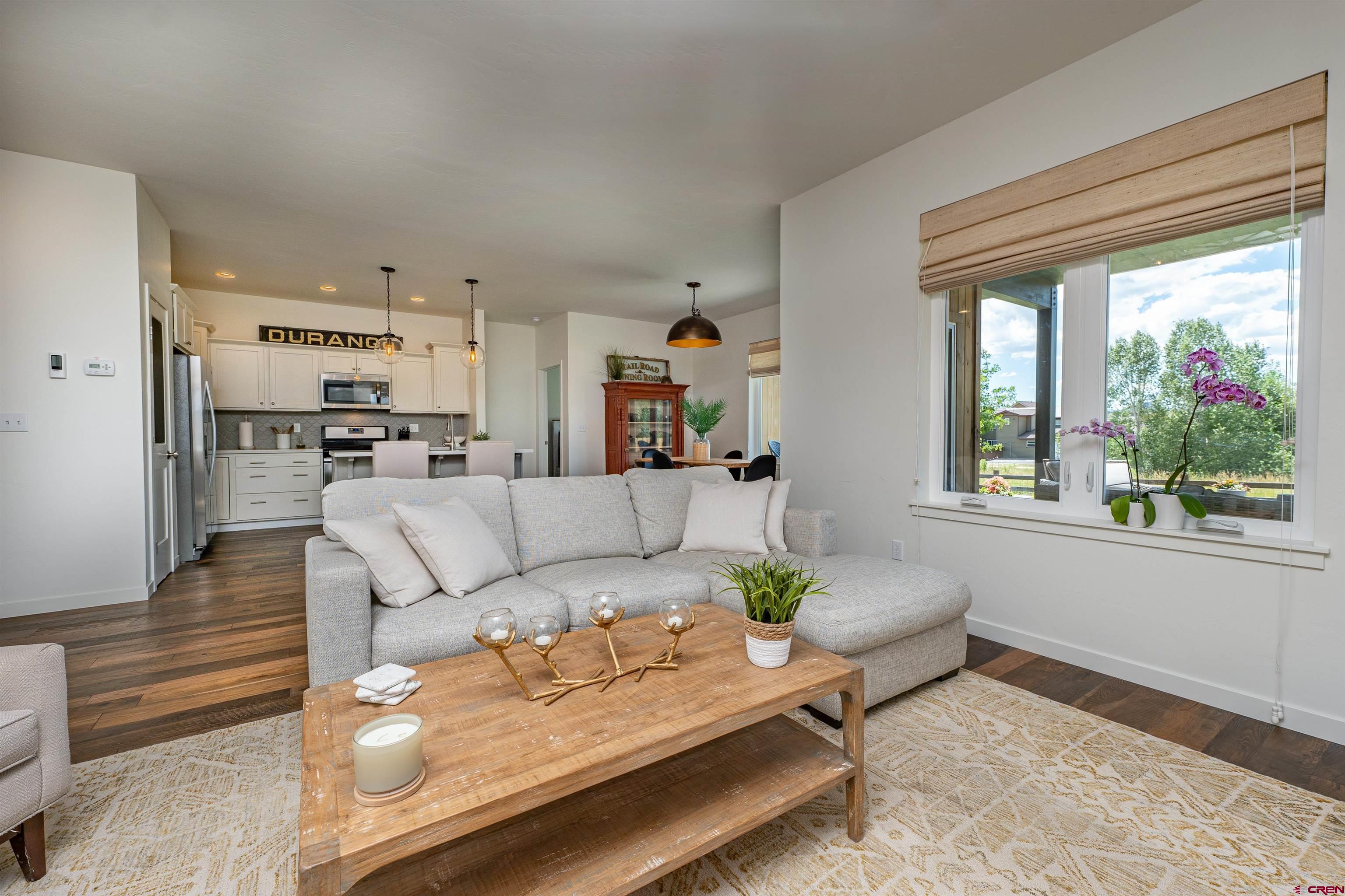 74 Prospector Avenue Durango, CO 81301 - Photo 5 of 30 a living room with furniture and a large window