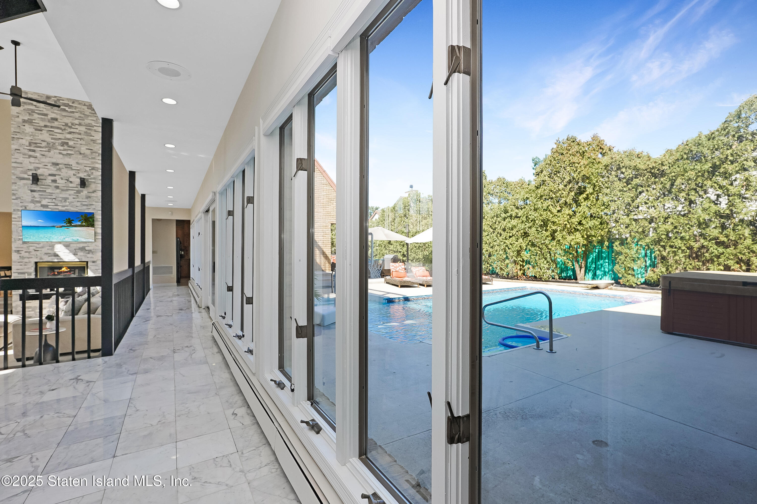 Undisclosed Address Staten Island, NY 10307 - Photo 11 of 72 a view of a porch with furniture
