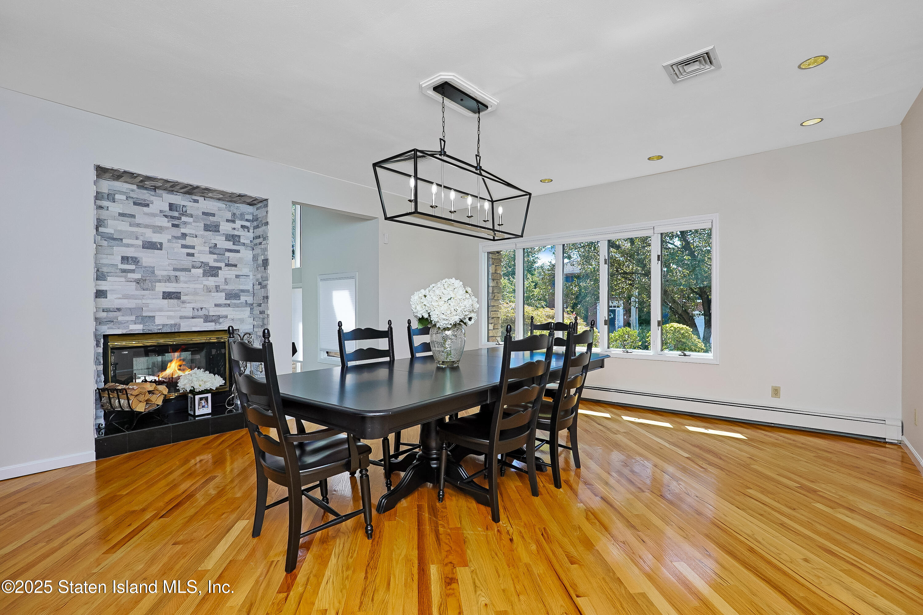 Undisclosed Address Staten Island, NY 10307 - Photo 22 of 72 a view of a dining room with furniture window and wooden floor