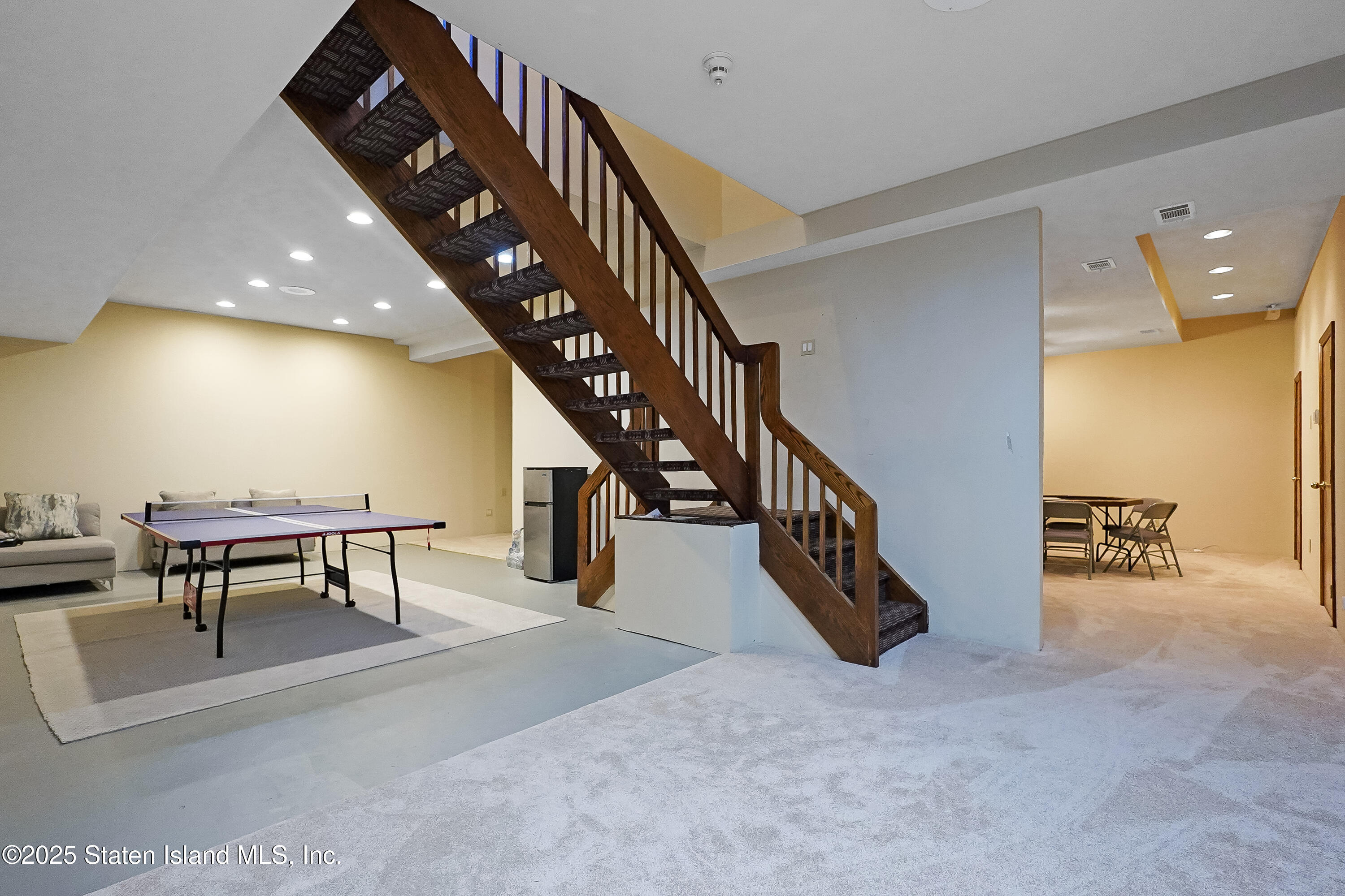 Undisclosed Address Staten Island, NY 10307 - Photo 49 of 72 a view of entryway and hall with wooden floor