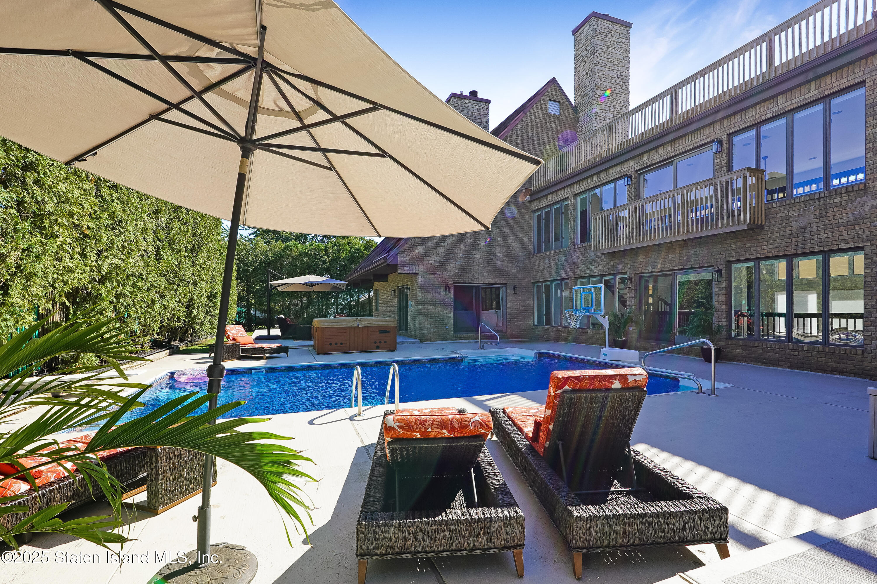 Undisclosed Address Staten Island, NY 10307 - Photo 54 of 72 a view of a patio with table and chairs potted plants