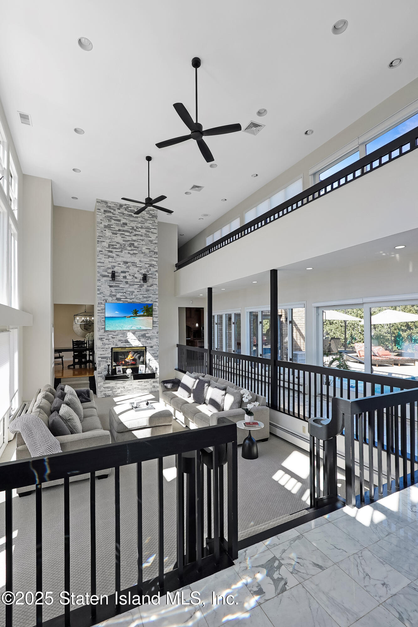 Undisclosed Address Staten Island, NY 10307 - Photo 10 of 72 a view of a dining room with furniture window and wooden floor
