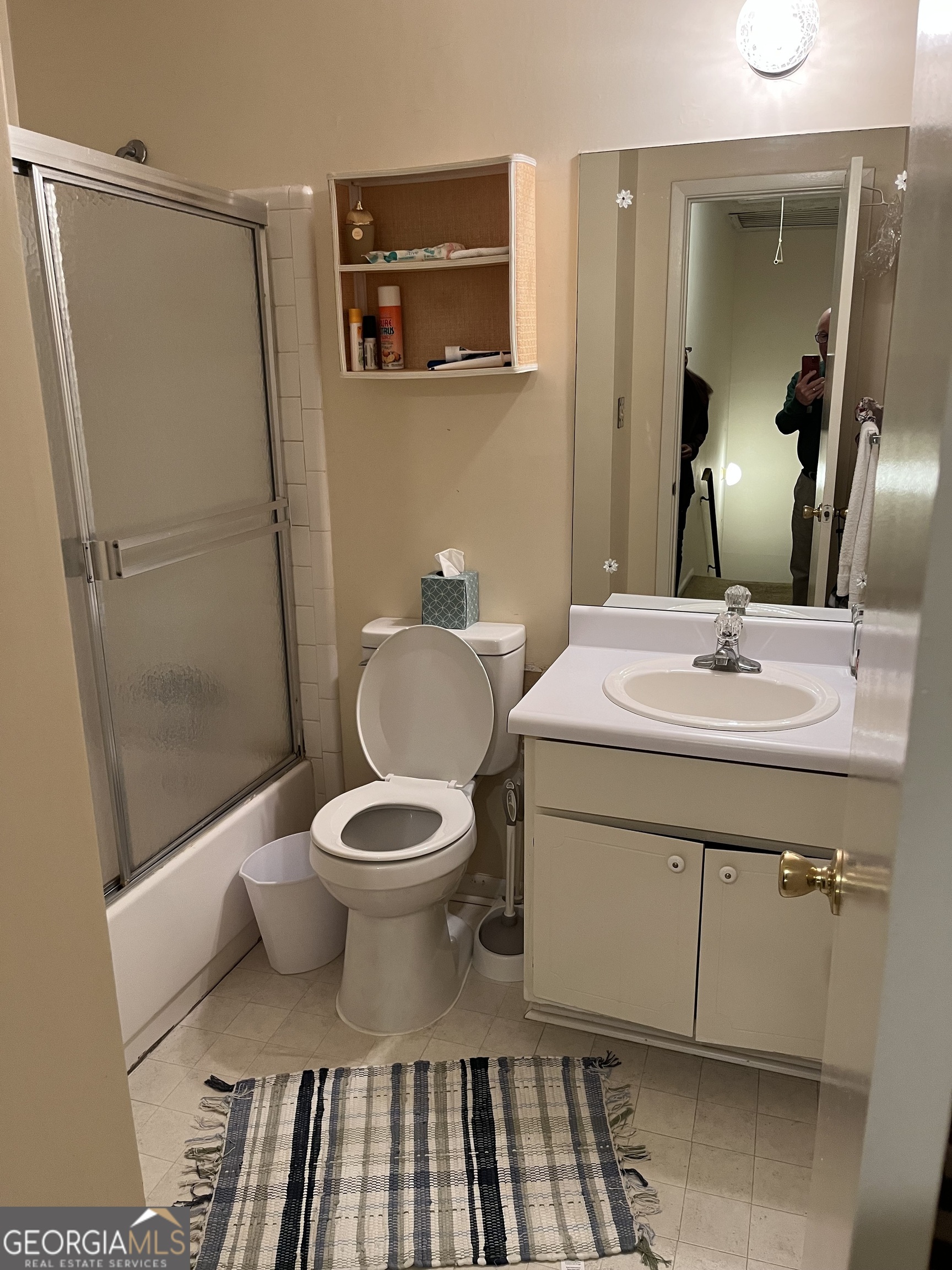 501 Carlton Road, Unit 4C Palmetto, GA 30268 - Photo 12 of 12 a bathroom with a sink a toilet and mirror