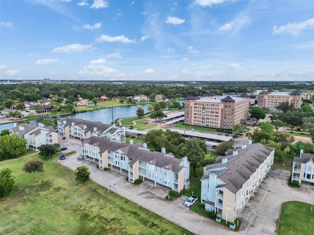 an aerial view of a city with lots of residential buildings