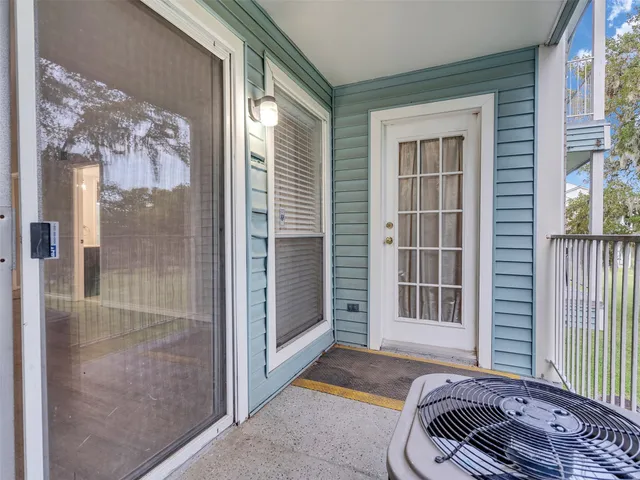 a view of a bedroom with a large window