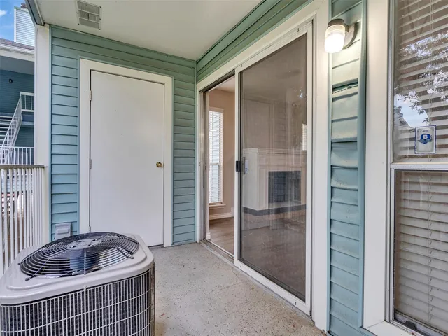 a bathroom with a tub and shower