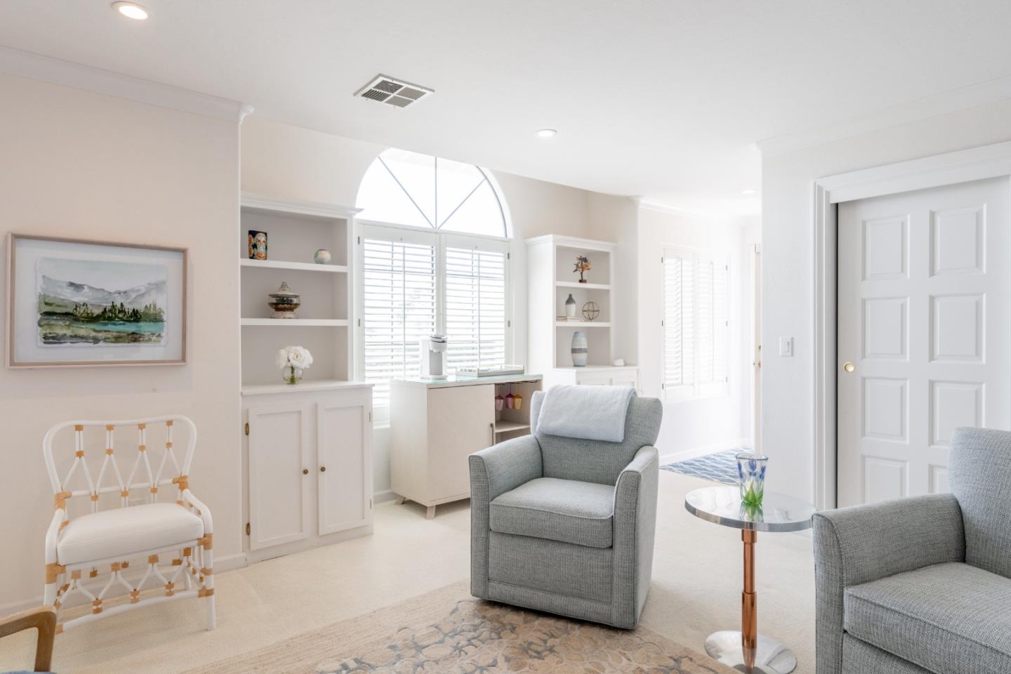 1043 Broncho Road Pebble Beach, CA 93953 - Photo 16 of 21 a living room with furniture a flat screen tv and a window