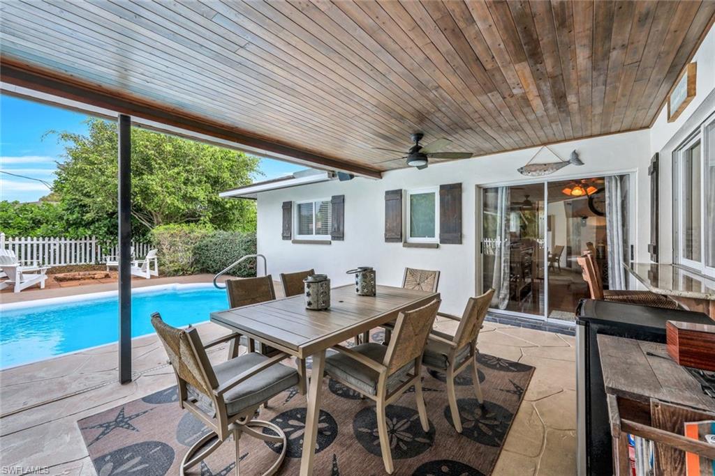 289 Burning Tree Drive Naples, FL 34105 - Photo 21 of 36 a outdoor space with furniture