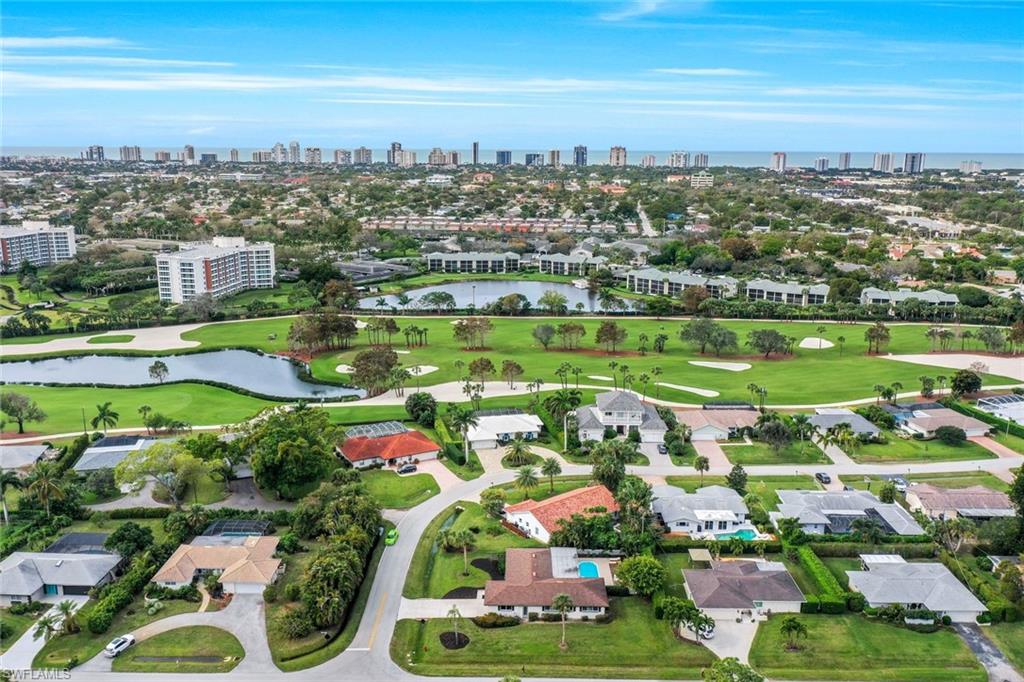 289 Burning Tree Drive Naples, FL 34105 - Photo 33 of 36 an aerial view of tennis court