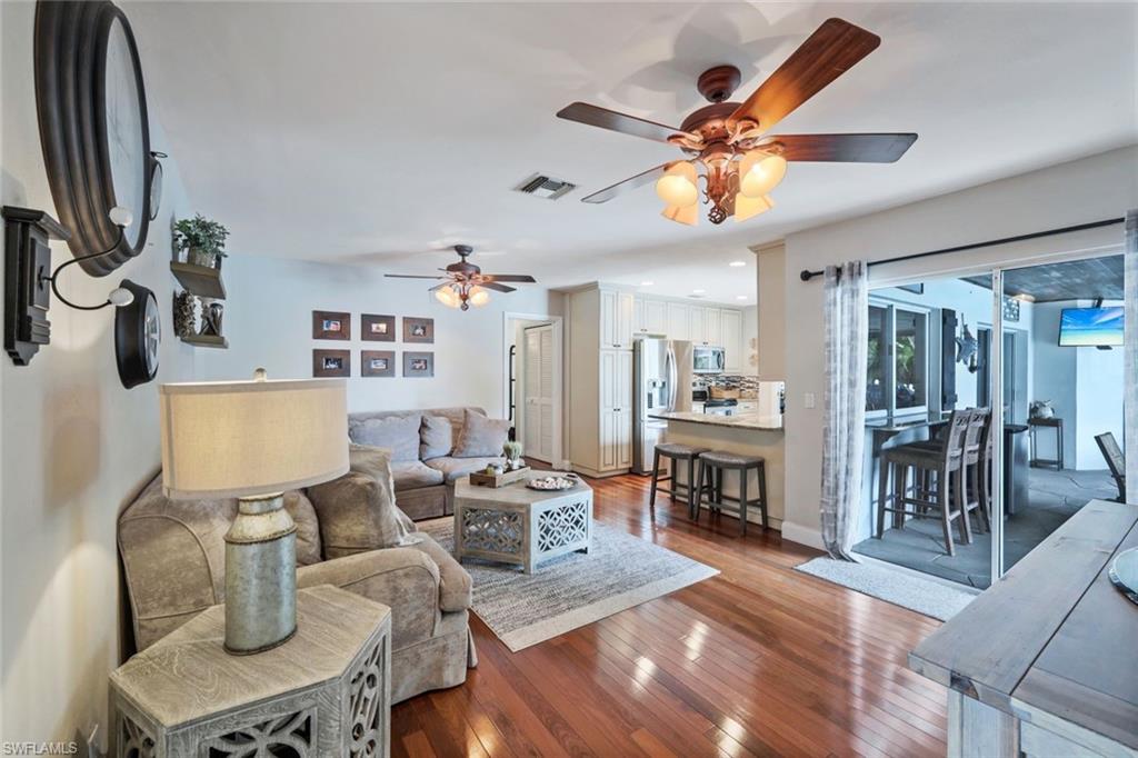 289 Burning Tree Drive Naples, FL 34105 - Photo 4 of 36 a living room with furniture