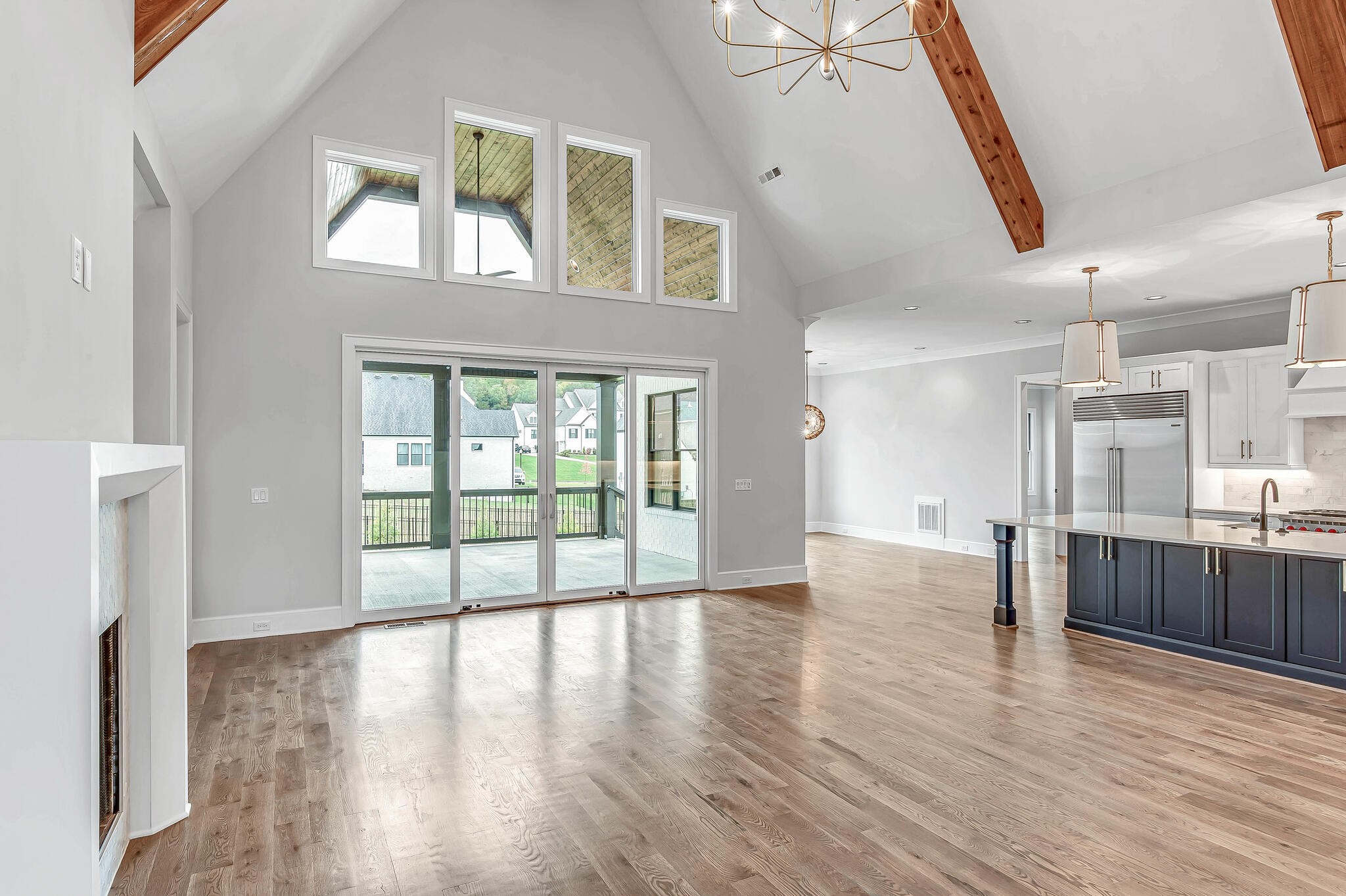 1891 Traditions Circle Franklin, TN 37067 - Photo 17 of 50 a view of an empty room with wooden floor and a window