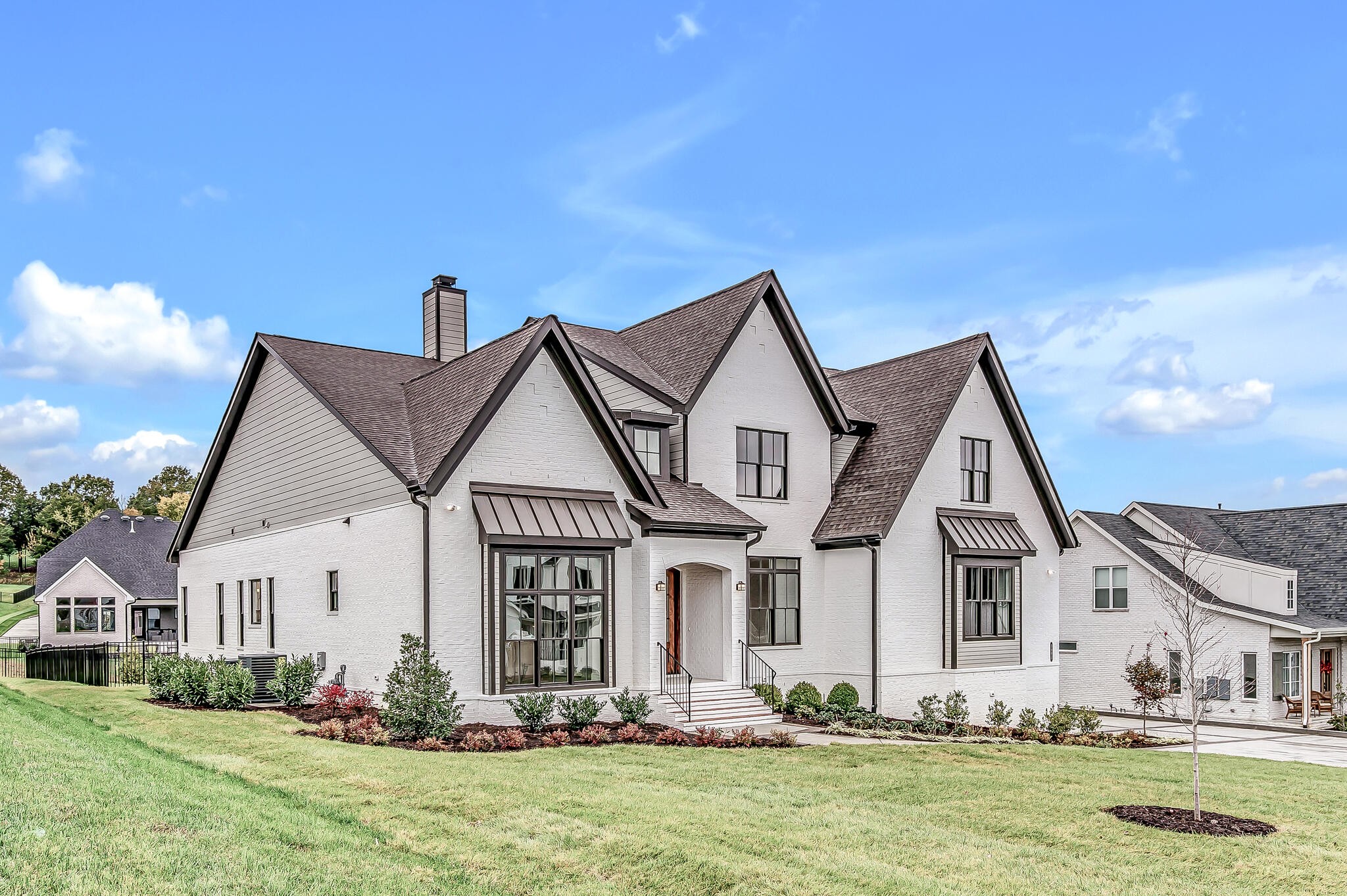 1891 Traditions Circle Franklin, TN 37067 - Photo 2 of 50 a front view of a house with garden