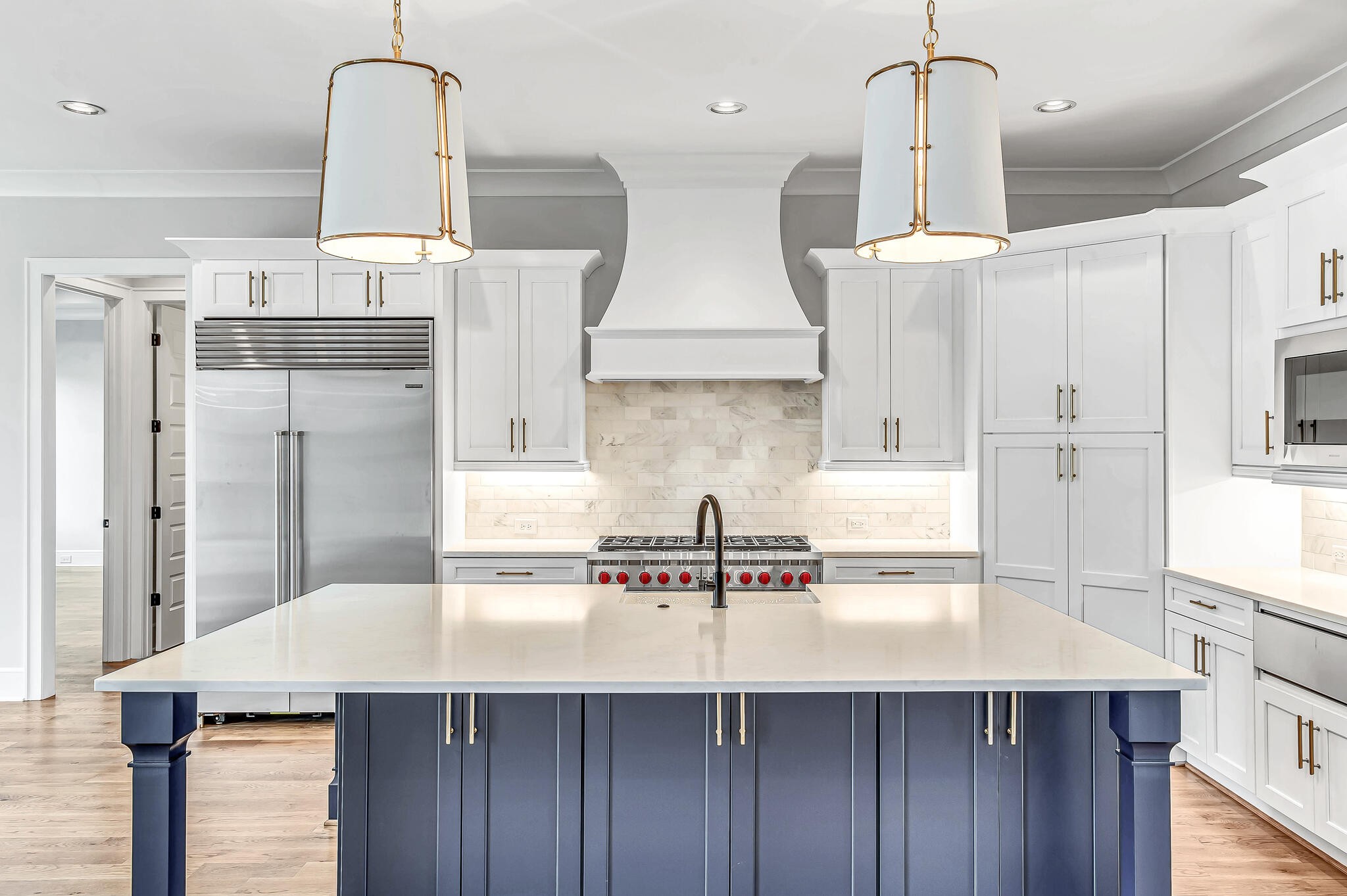 1891 Traditions Circle Franklin, TN 37067 - Photo 21 of 50 a kitchen with stainless steel appliances a sink a counter space and cabinets
