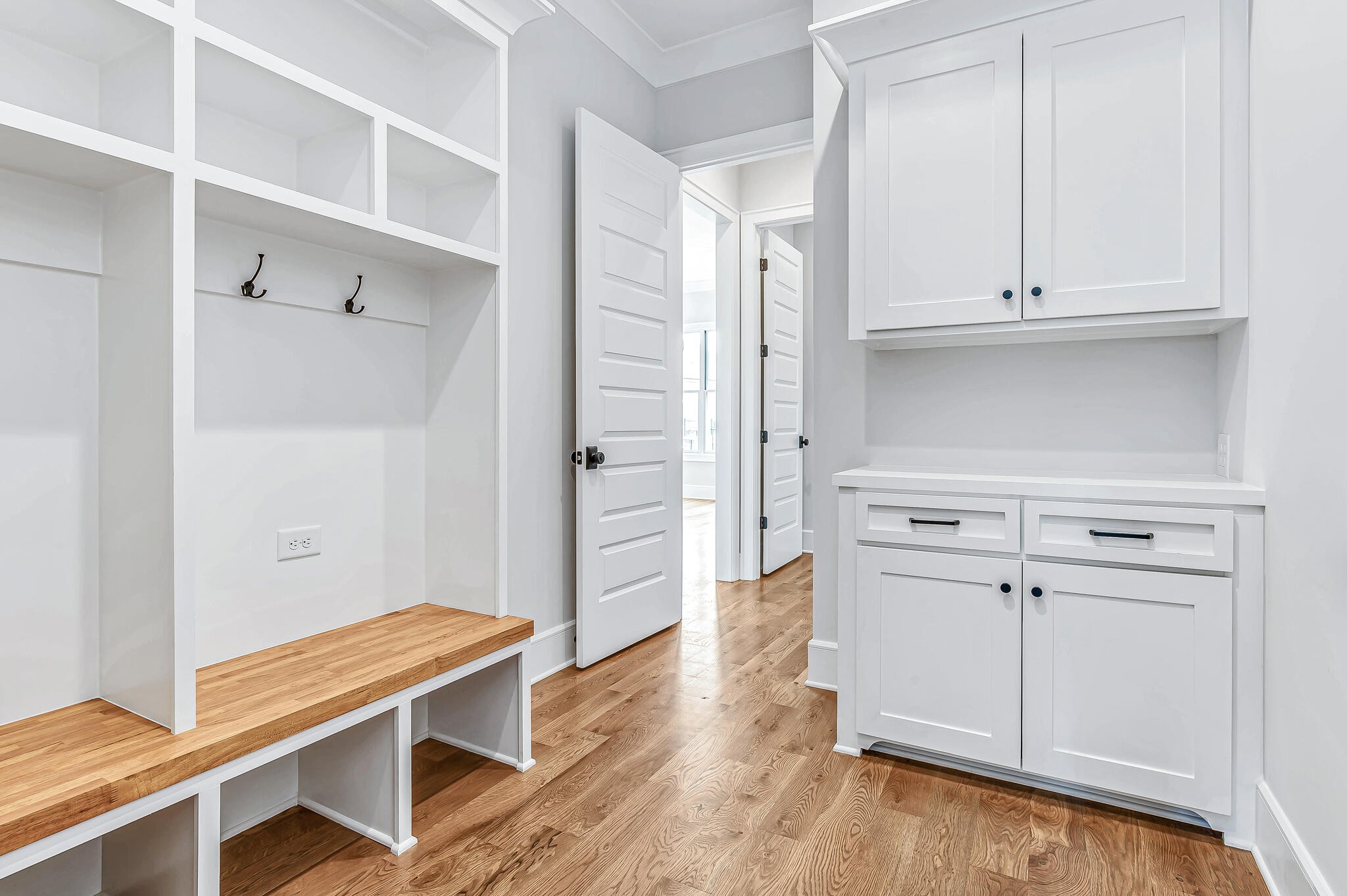 1891 Traditions Circle Franklin, TN 37067 - Photo 27 of 50 a room with white cabinets and wooden floor