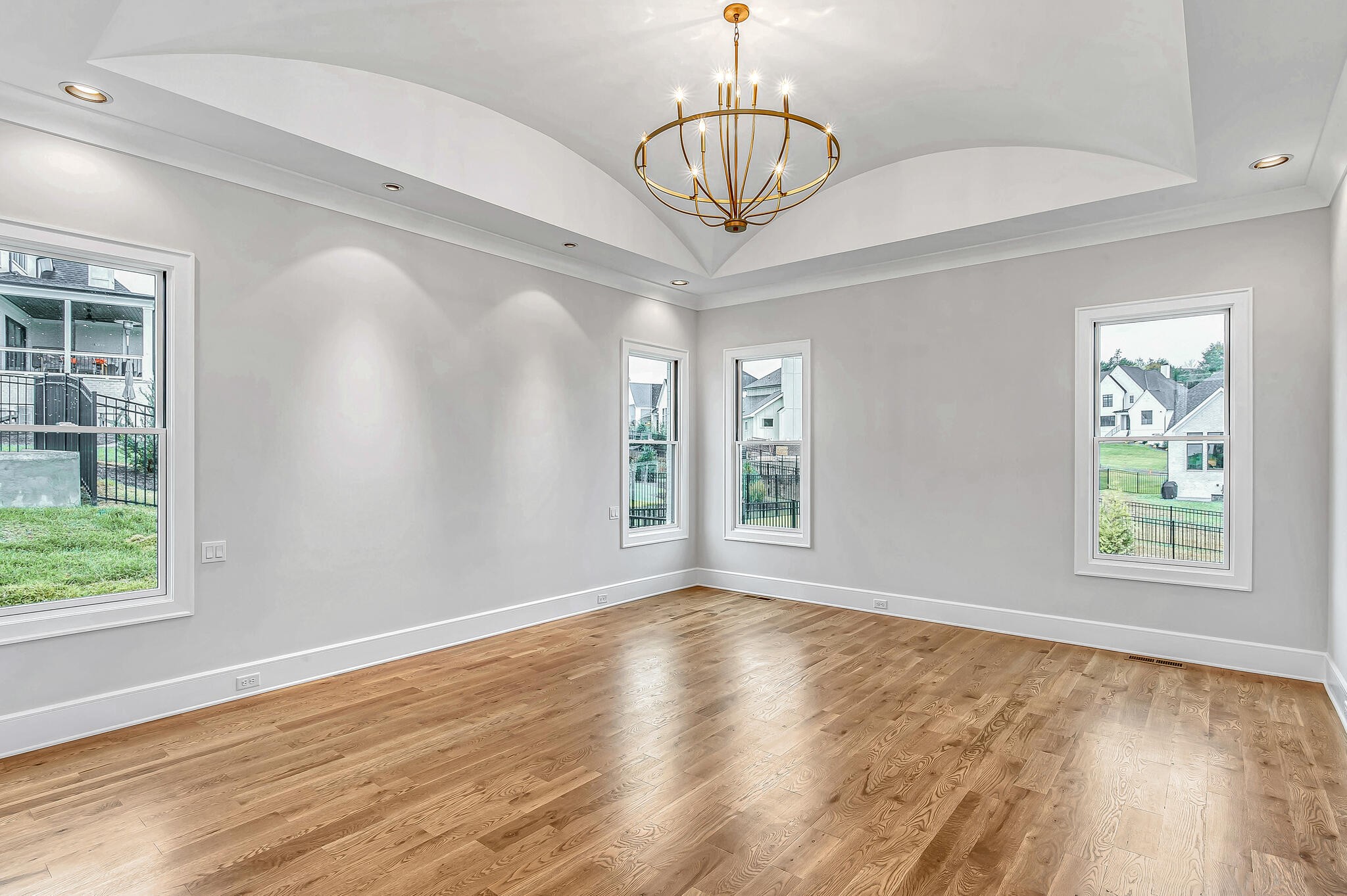 1891 Traditions Circle Franklin, TN 37067 - Photo 29 of 50 a view of an empty room with wooden floor and a window