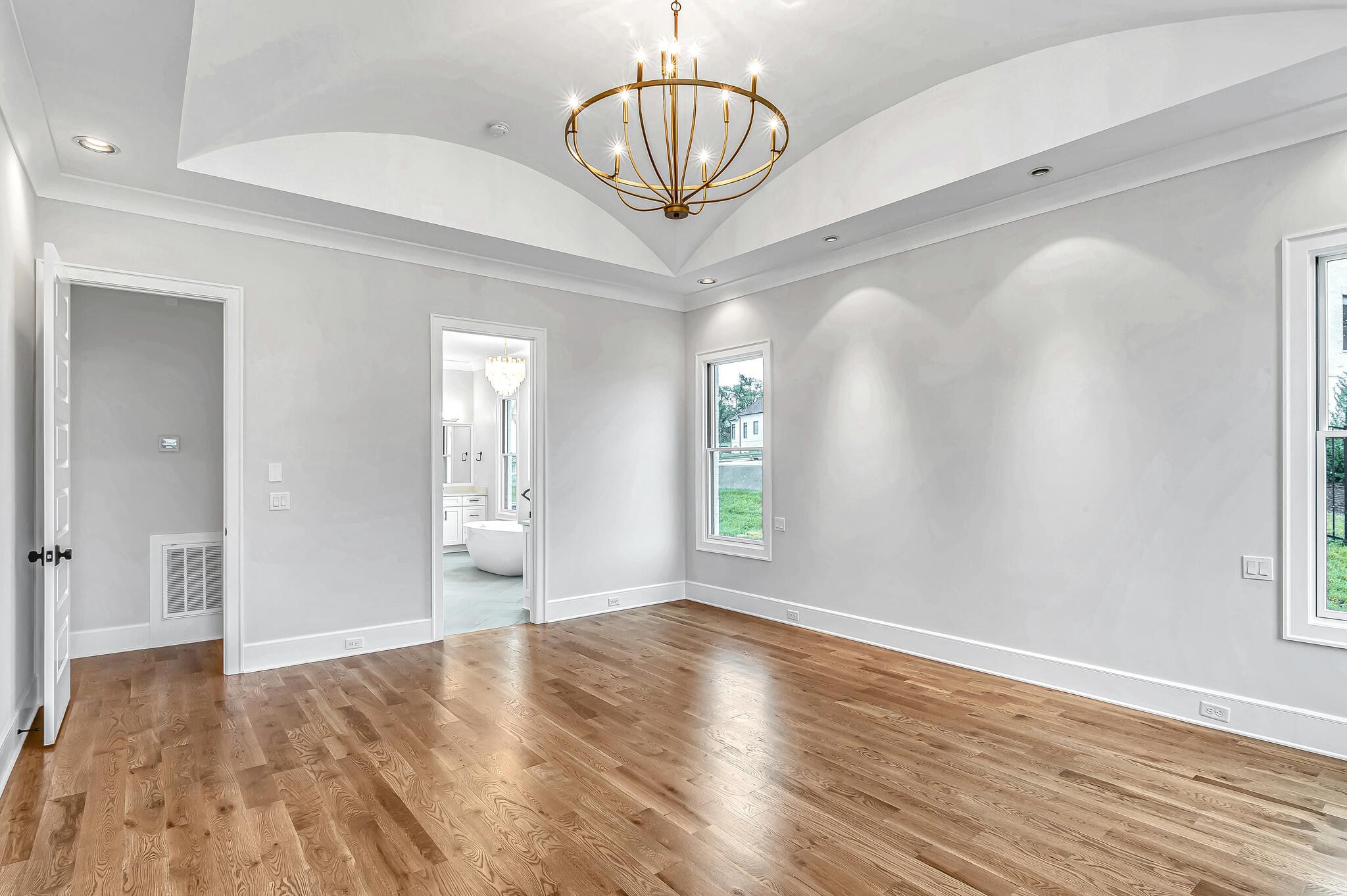 1891 Traditions Circle Franklin, TN 37067 - Photo 30 of 50 a view of an empty room with wooden floor and a window