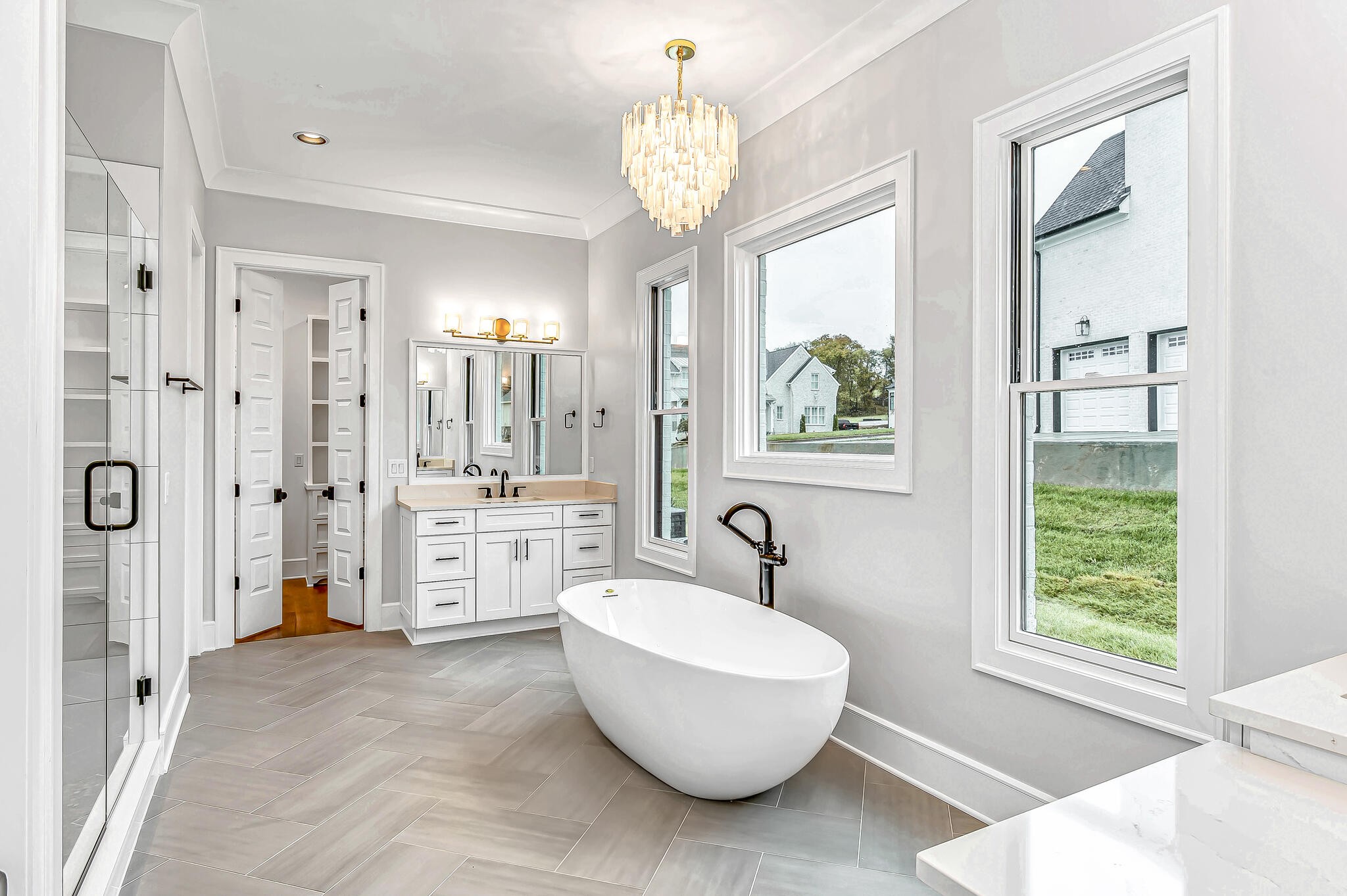 1891 Traditions Circle Franklin, TN 37067 - Photo 31 of 50 a spacious bathroom with a double vanity sink mirror and a bathtub