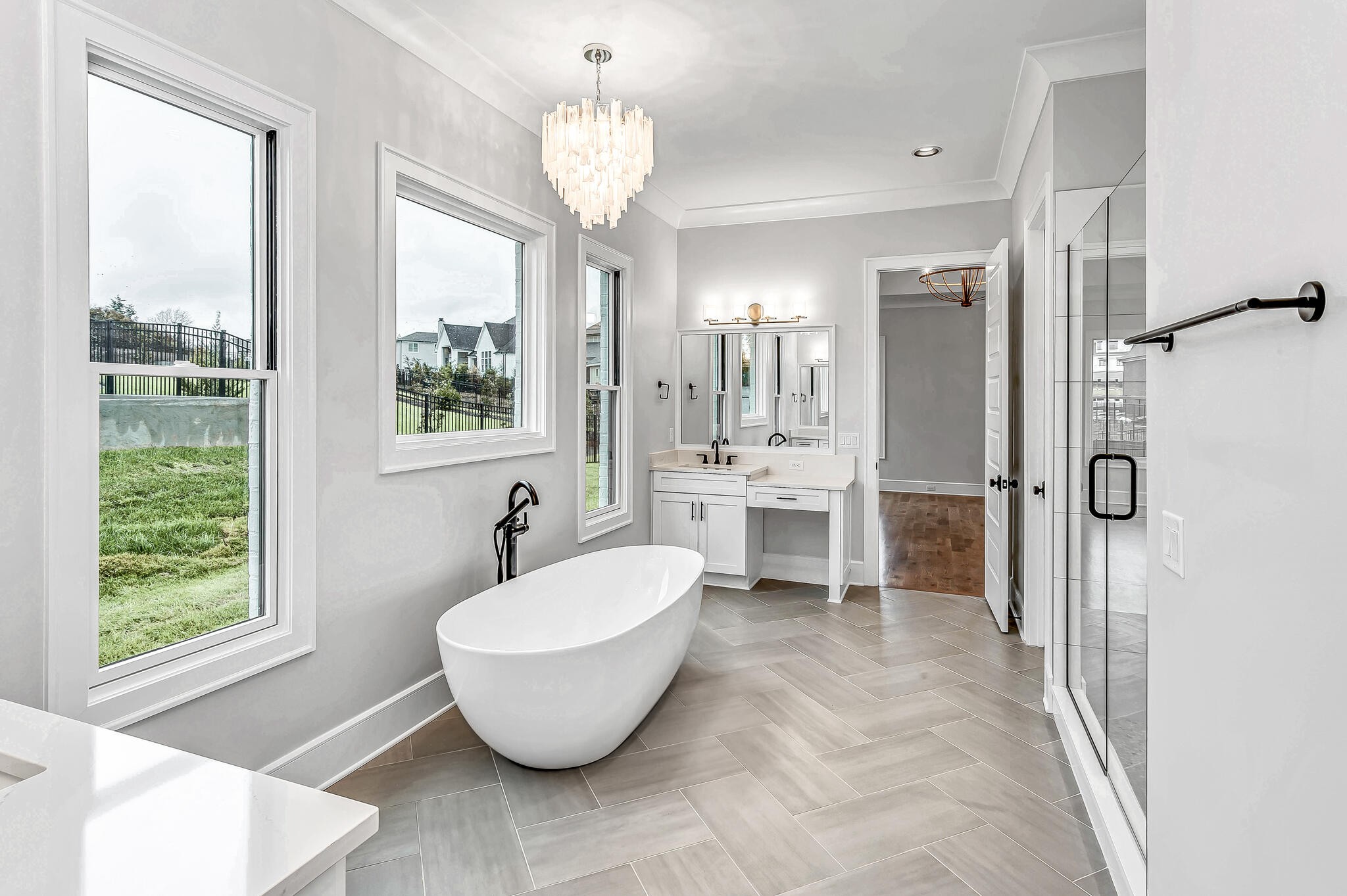 1891 Traditions Circle Franklin, TN 37067 - Photo 32 of 50 a spacious bathroom with a double vanity sink a mirror and a shower