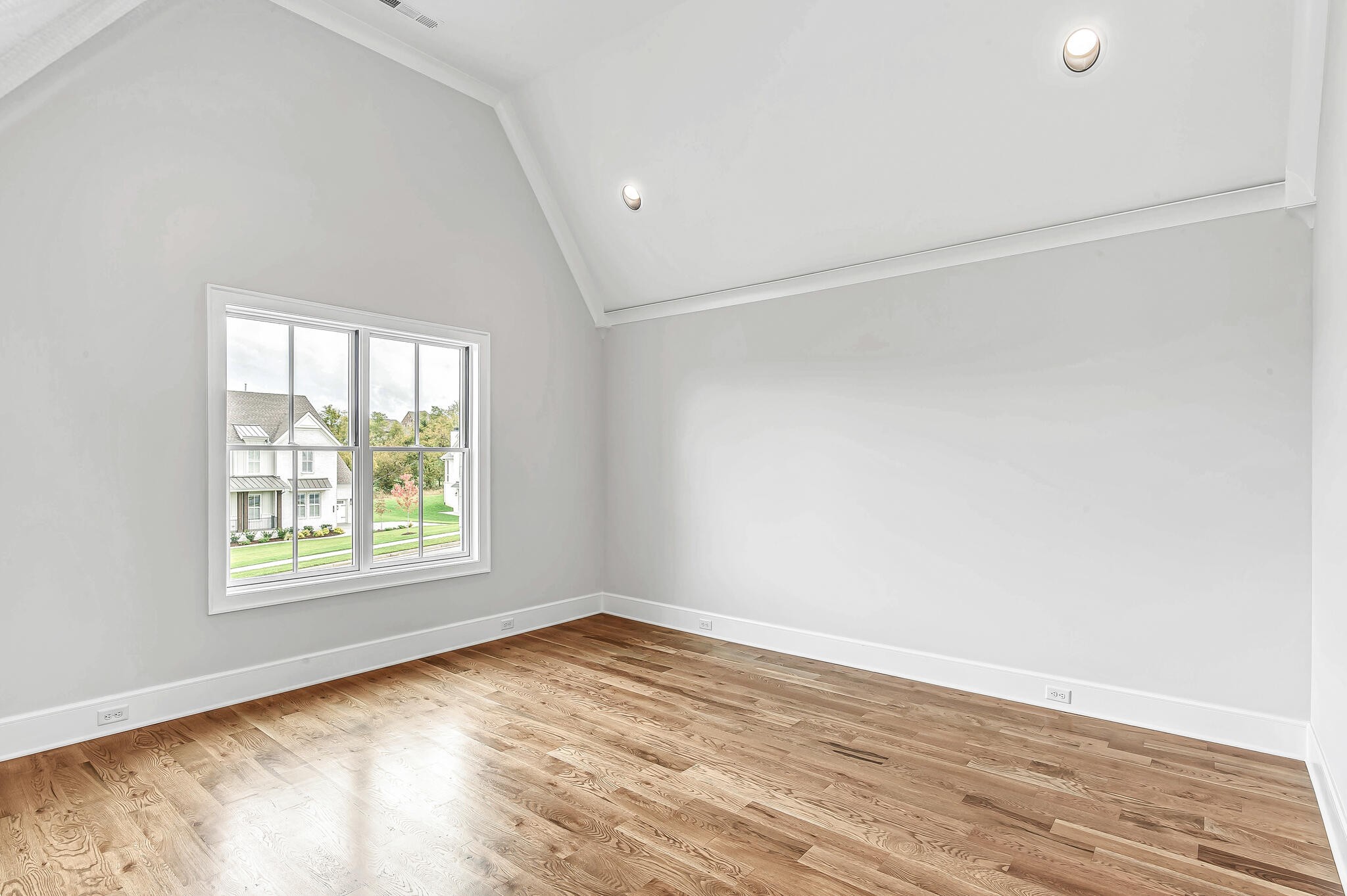 1891 Traditions Circle Franklin, TN 37067 - Photo 40 of 50 an empty room with wooden floor and windows