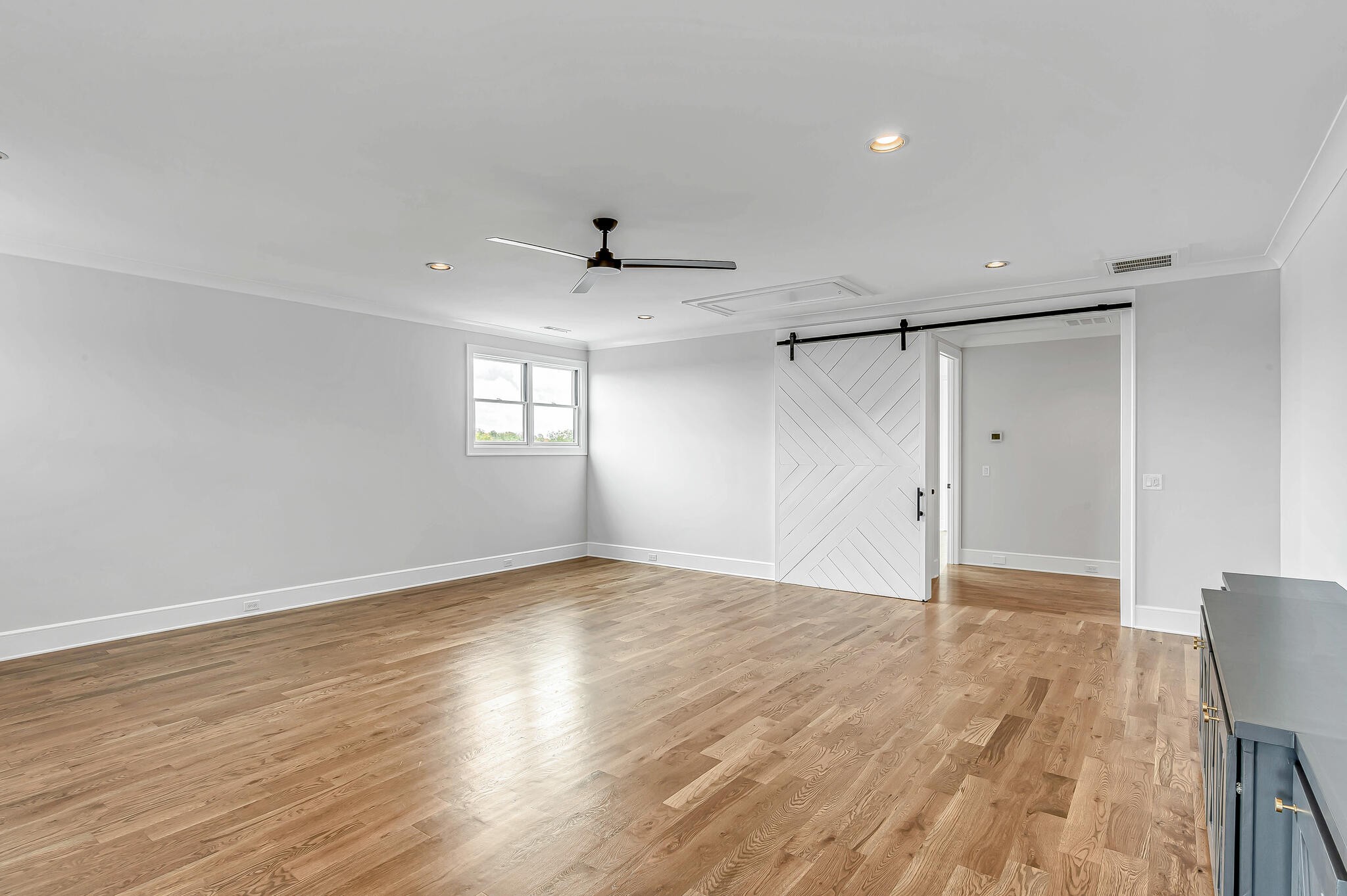 1891 Traditions Circle Franklin, TN 37067 - Photo 47 of 50 an empty room with wooden floor and windows