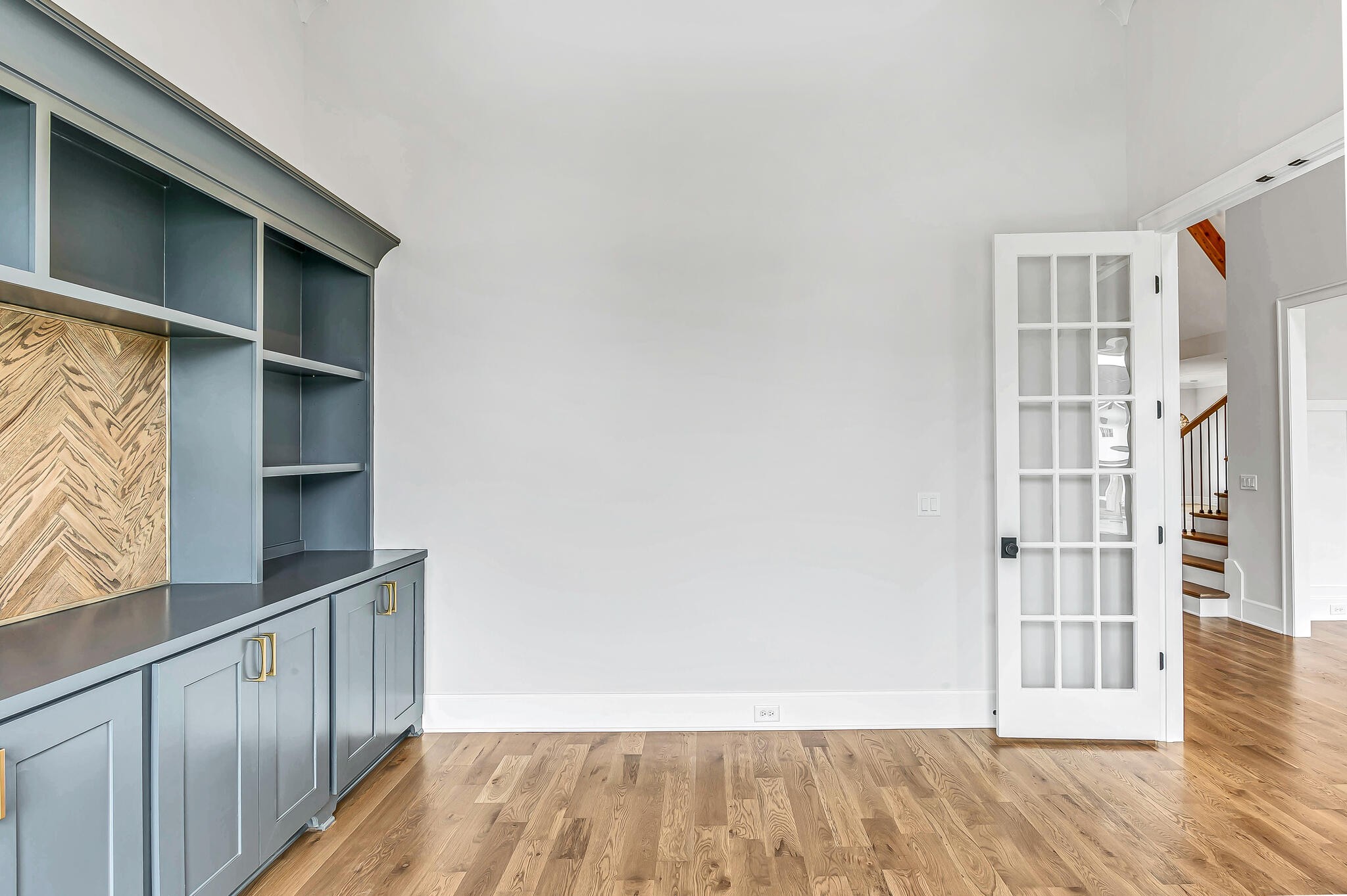1891 Traditions Circle Franklin, TN 37067 - Photo 10 of 50 a view of a livingroom with wooden floor and a window