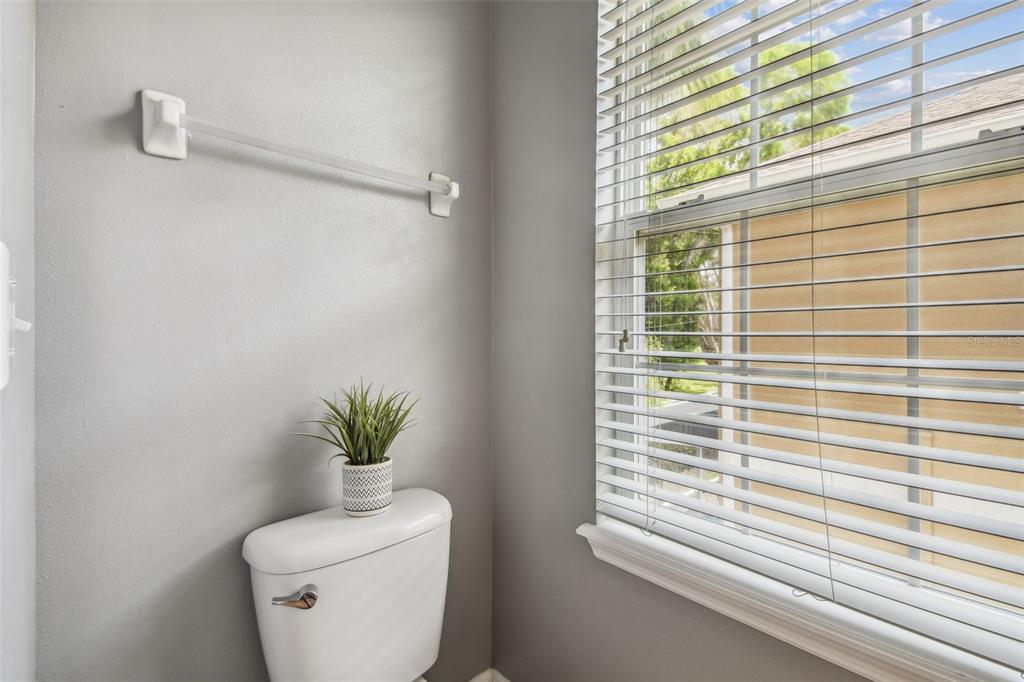7001 Interbay Boulevard, Unit 134 Tampa, FL 33616 - Photo 37 of 84 a bathroom with a toilet a sink and a window