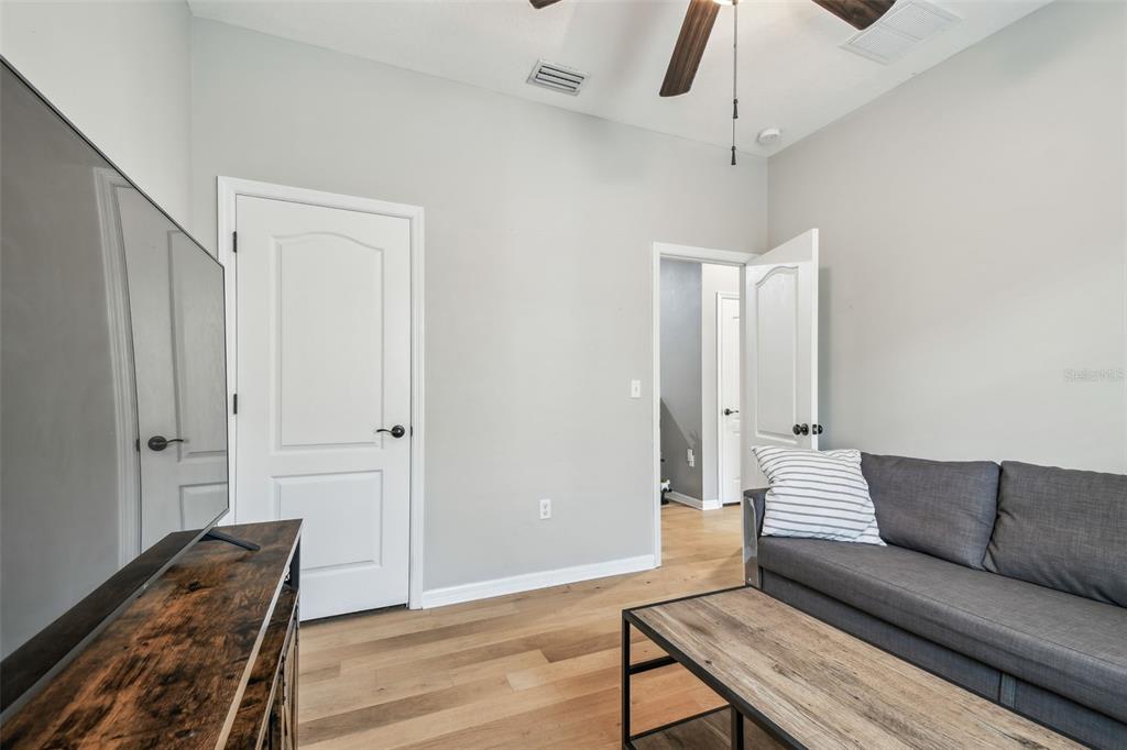 7001 Interbay Boulevard, Unit 134 Tampa, FL 33616 - Photo 42 of 84 a living room with furniture and wooden floor
