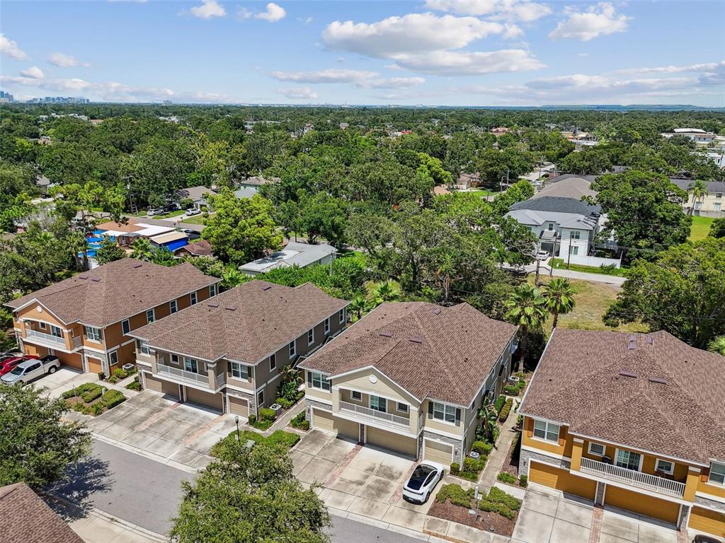 7001 Interbay Boulevard, Unit 134 Tampa, FL 33616 - Photo 56 of 84 an aerial view of a house with a yard garage and mountain view in back