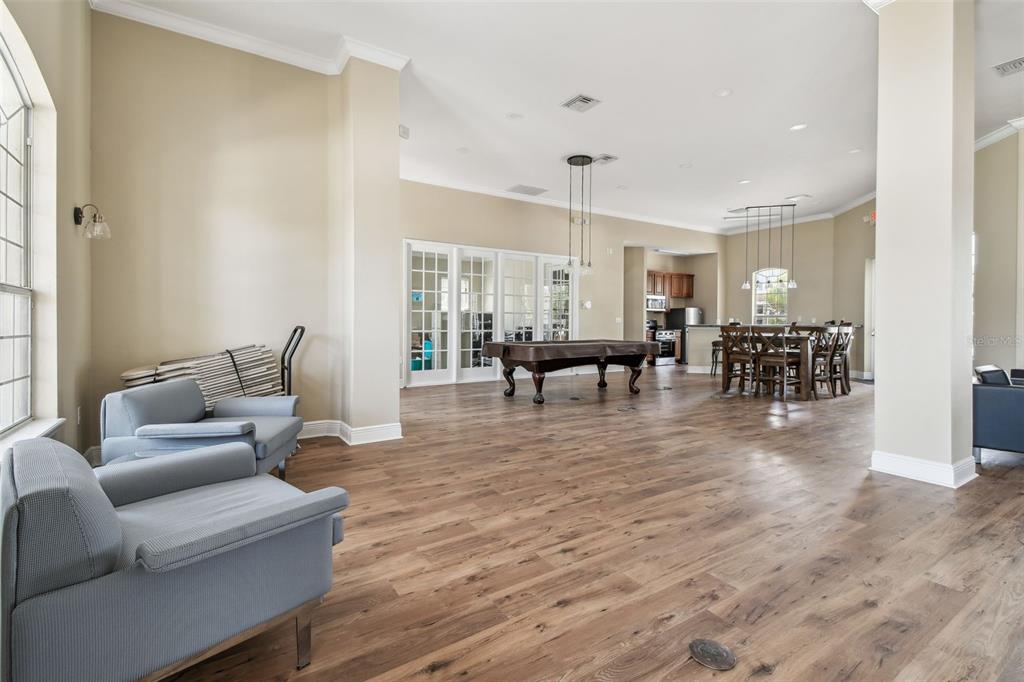 7001 Interbay Boulevard, Unit 134 Tampa, FL 33616 - Photo 61 of 84 a living room with furniture and a wooden floor