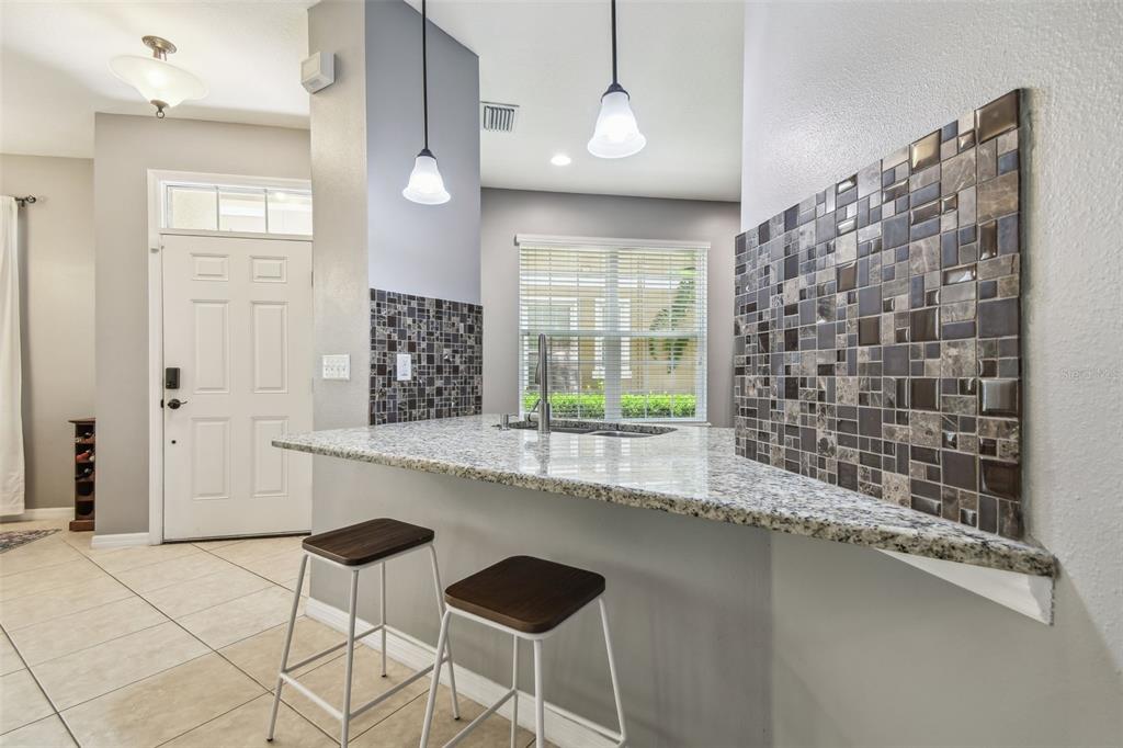 7001 Interbay Boulevard, Unit 134 Tampa, FL 33616 - Photo 8 of 84 a kitchen with a sink and a refrigerator