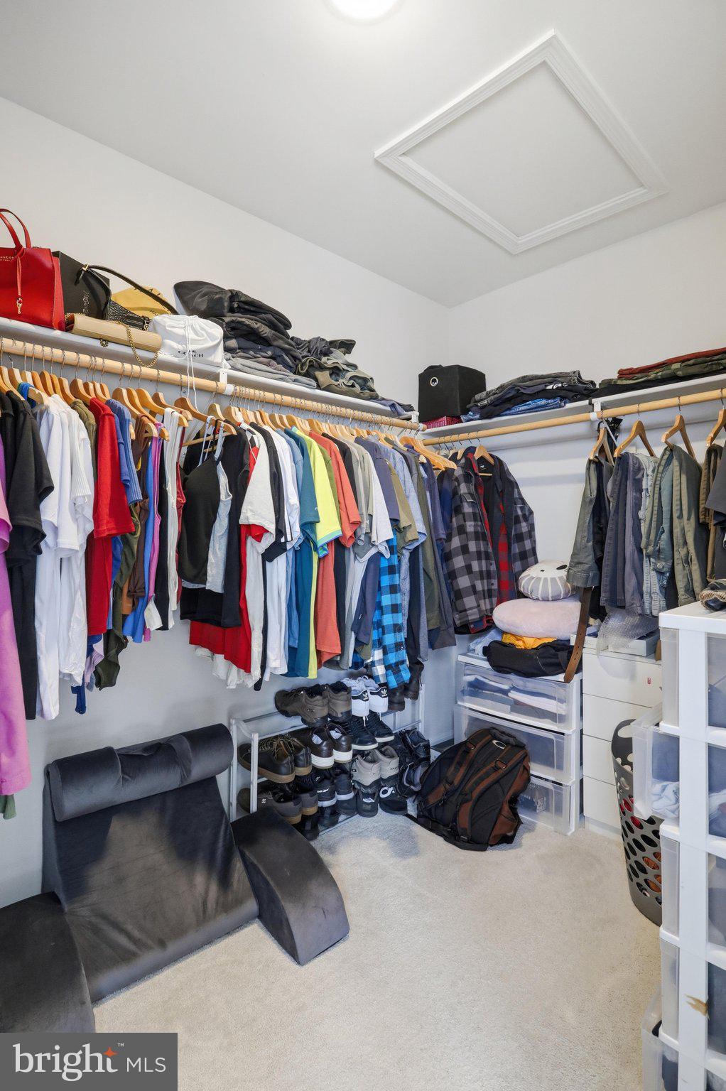 172 Rerdiz Road Hedgesville, WV 25427 - Photo 28 of 36 a view of walk in closet with clothes and shoes